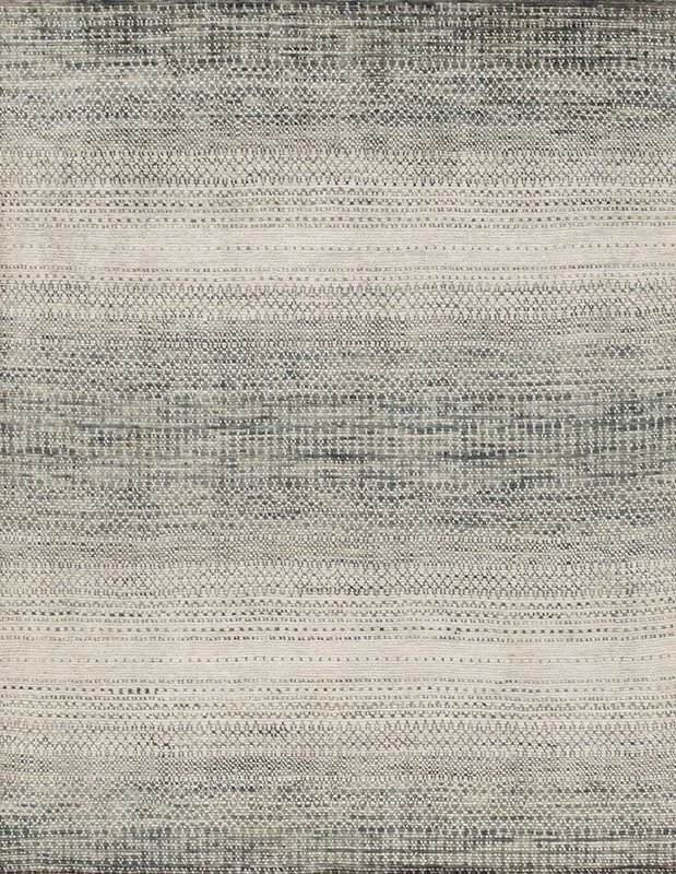 Close-up of a woven fabric with horizontal patterns in shades of gray and white.