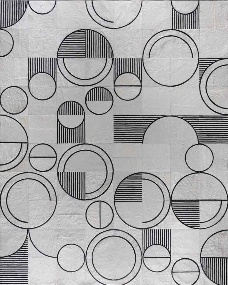 Black and white geometric pattern with overlapping circles, semicircles, and lines on a textured white background.