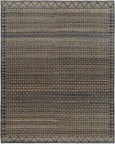 A rectangular area rug with a geometric pattern of small interconnected hexagons in shades of beige, brown, and black, featuring a dark border with intricate designs.