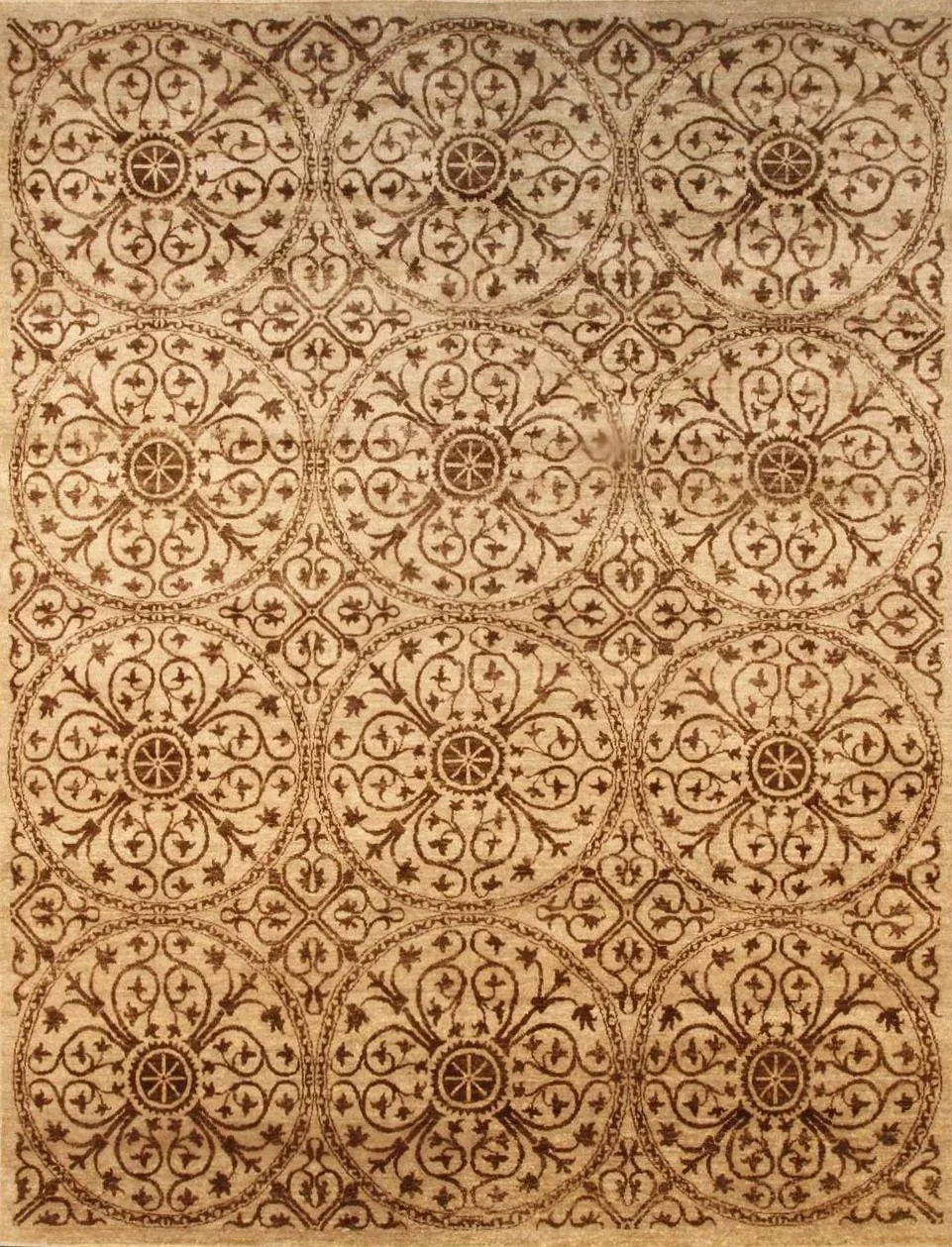Decorative pattern with repeating circular floral motifs in brown and beige colors.
