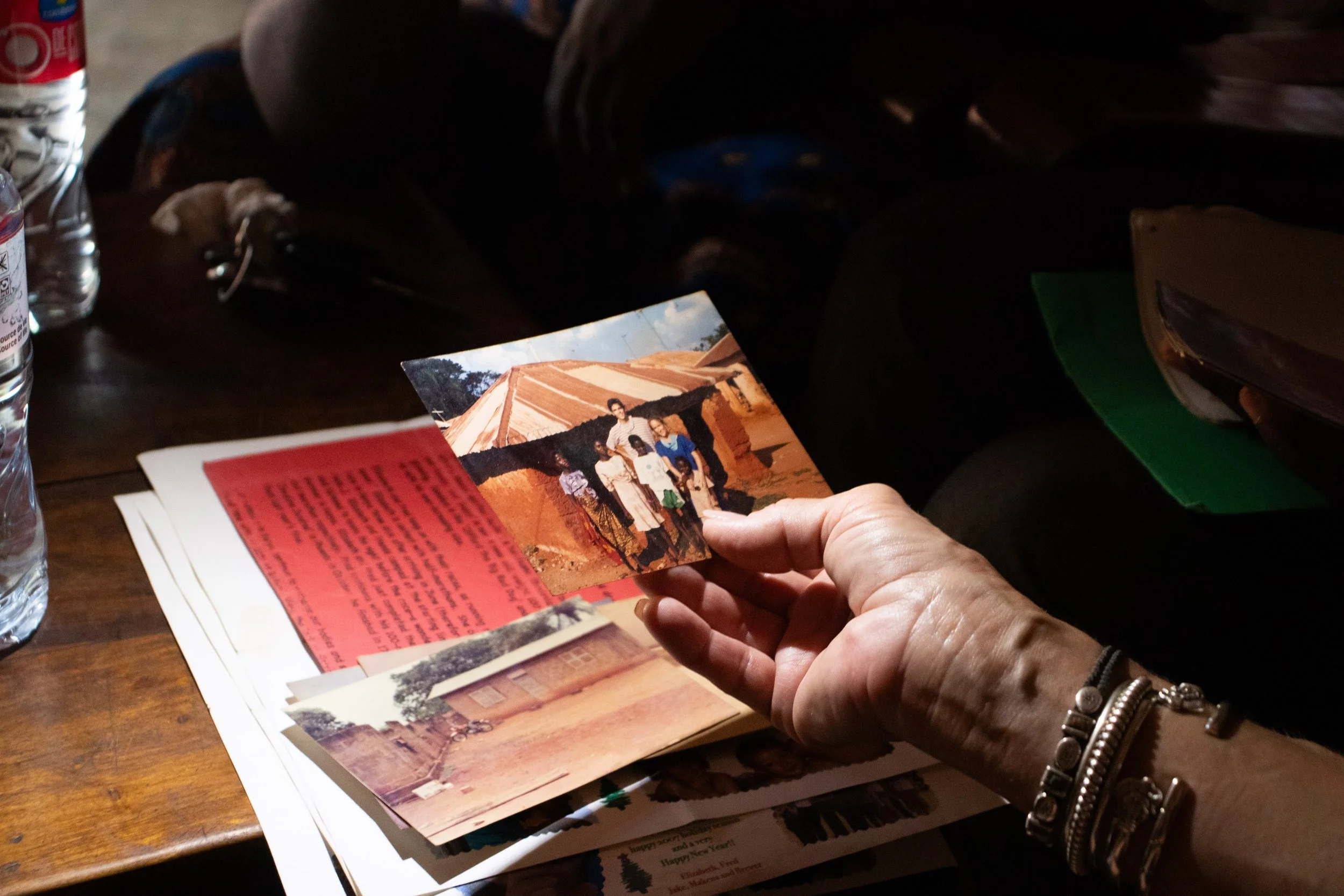 A picture of my mother, another volunteer, and the kids standing in a museum in Abomey, one of the neighboring towns. One of the many outings they took together. (image from 1989) taken in August 2024.