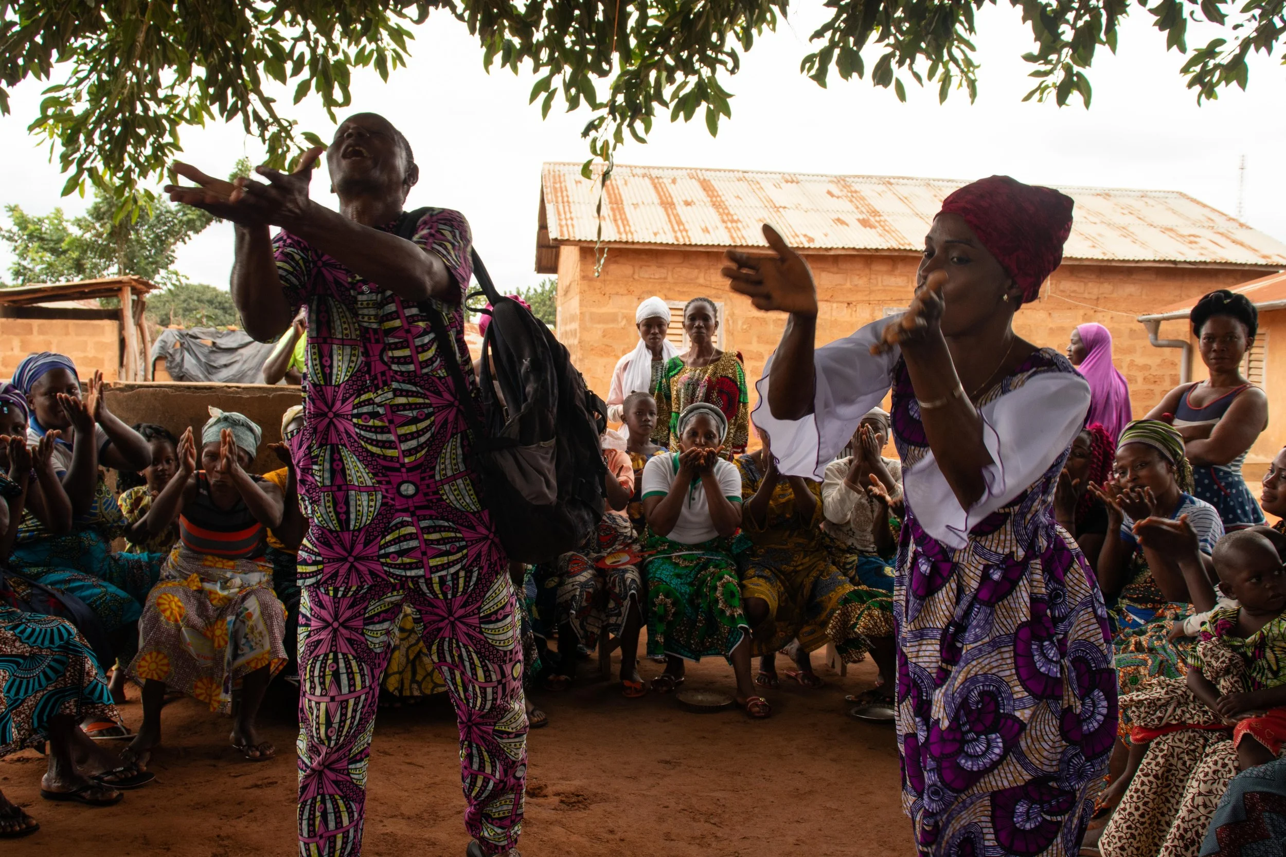 A way of greeting someone; by holding your hands to your heart, then extending your hands to the guest so the guest may receive the guester, August 2025. 