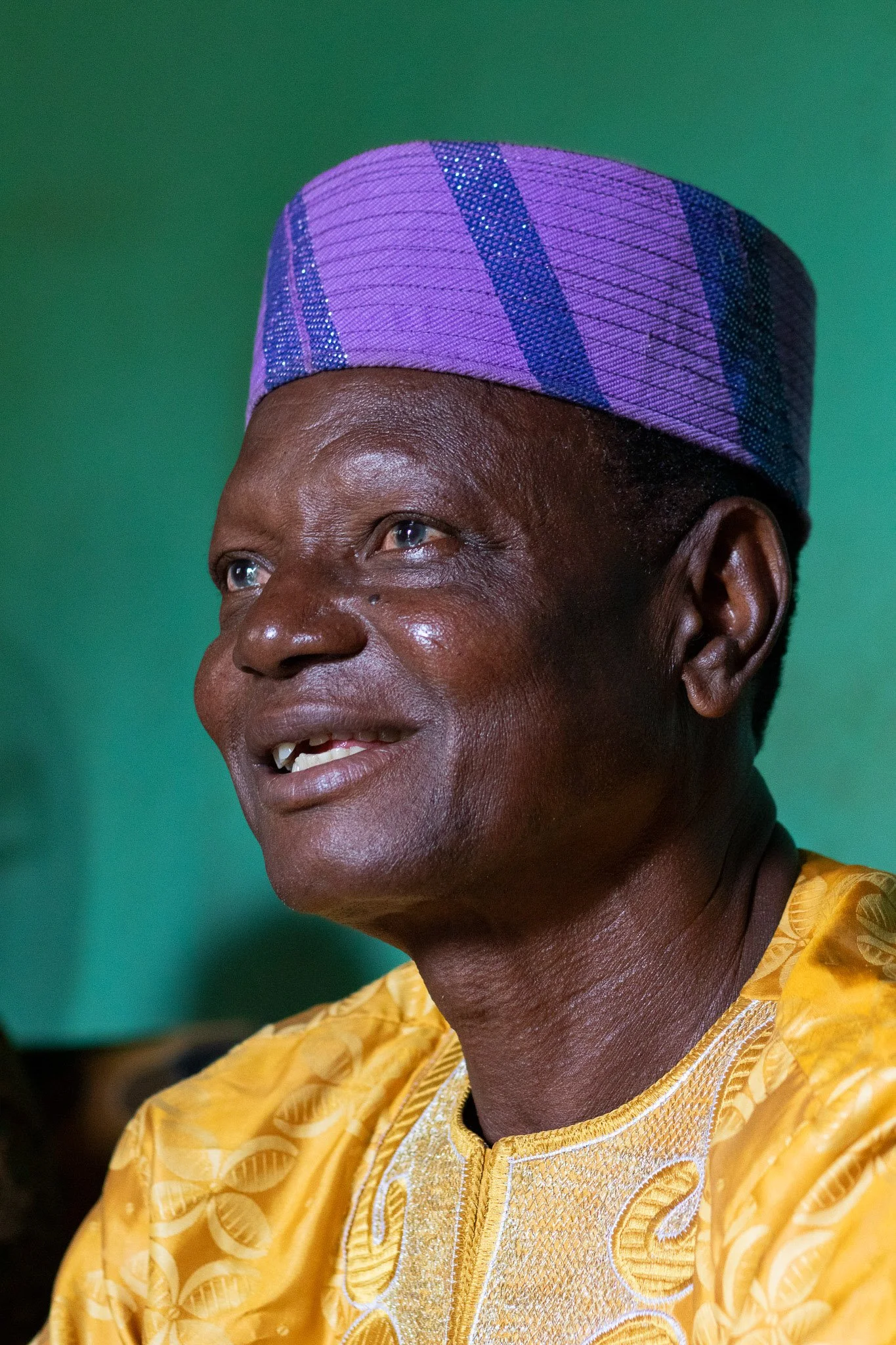 Kantos is originally from Houedogli, he has been an activist or teacher his whole life. He worked for the Peace Corps as a language instructor on and off throughout the years. Kantos carries on working with these communities, August 2024. 