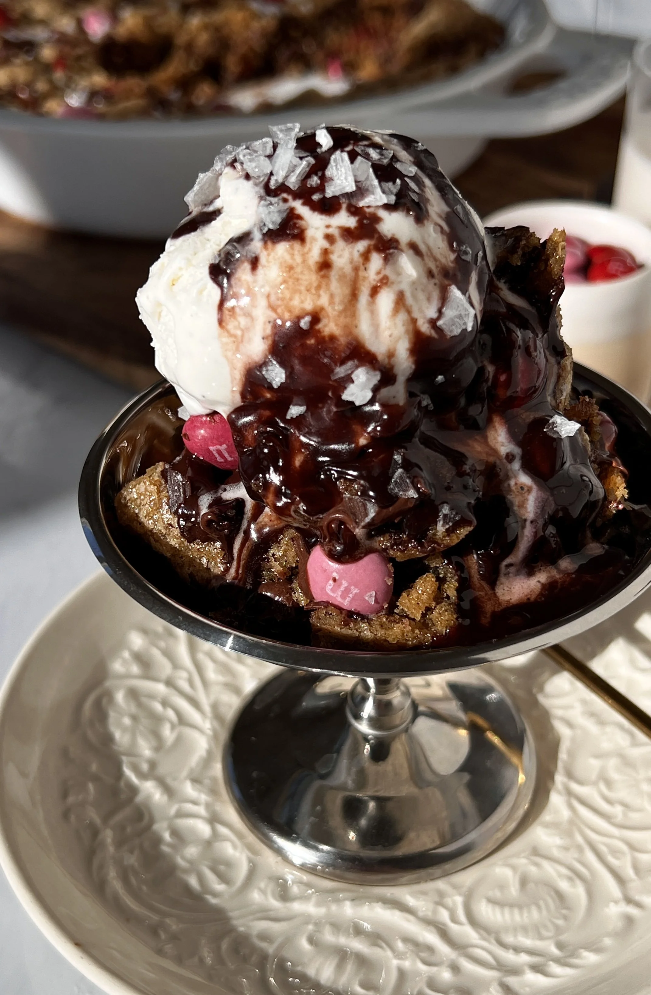 Close-up of scoopable brown butter chocolate chip cookies showing gooey centers and melted chocolate chips.