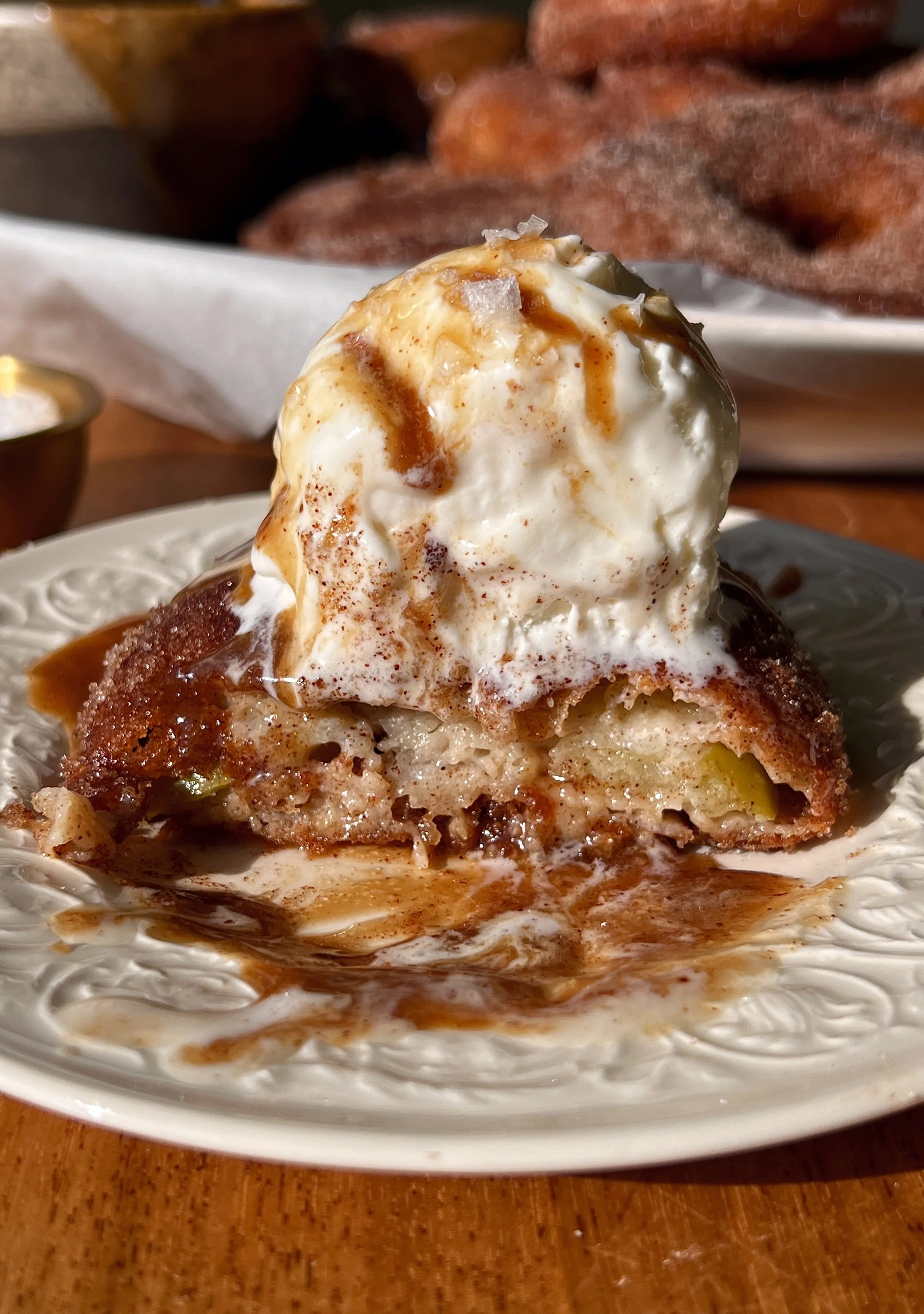 Perfectly golden and crisp sourdough buttermilk fried apple rings coated in cinnamon sugar served warm with an easy salted caramel dipping sauce as the ultimate cozy fall treat.