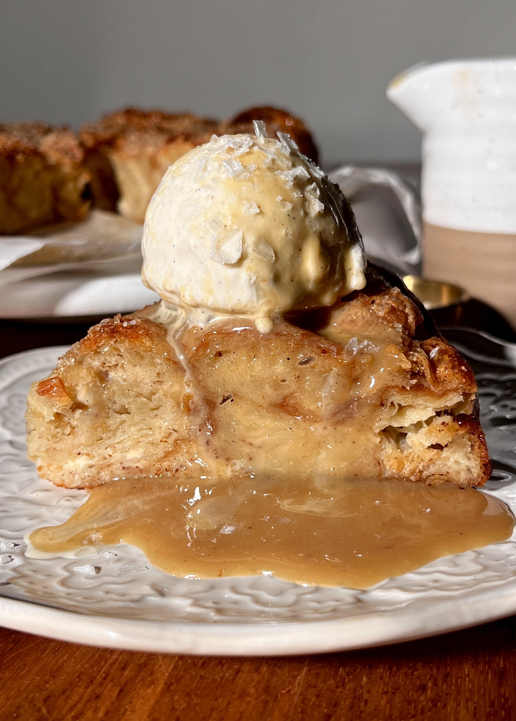 Vanilla Bean Croissant Bread Pudding with Buttered Caramel Rum Sauce
