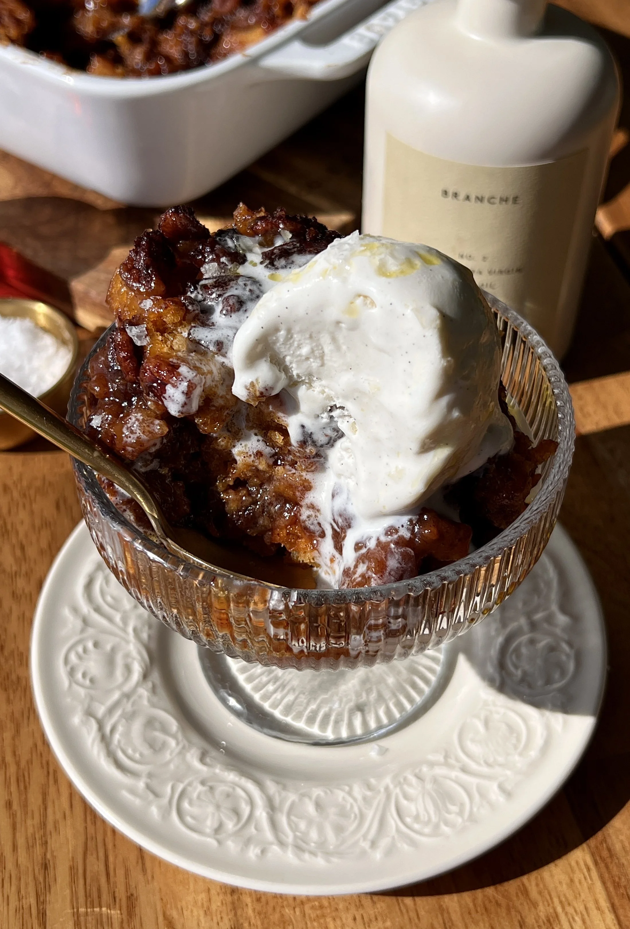 Warm and cozy brown butter sweet potato pecan pudding cake with a beautifully golden crisp top and gooey syrupy bottom served warm with a scoop of vanilla ice cream and a sprinkle of flaky sea salt as the ultimate fall dessert.