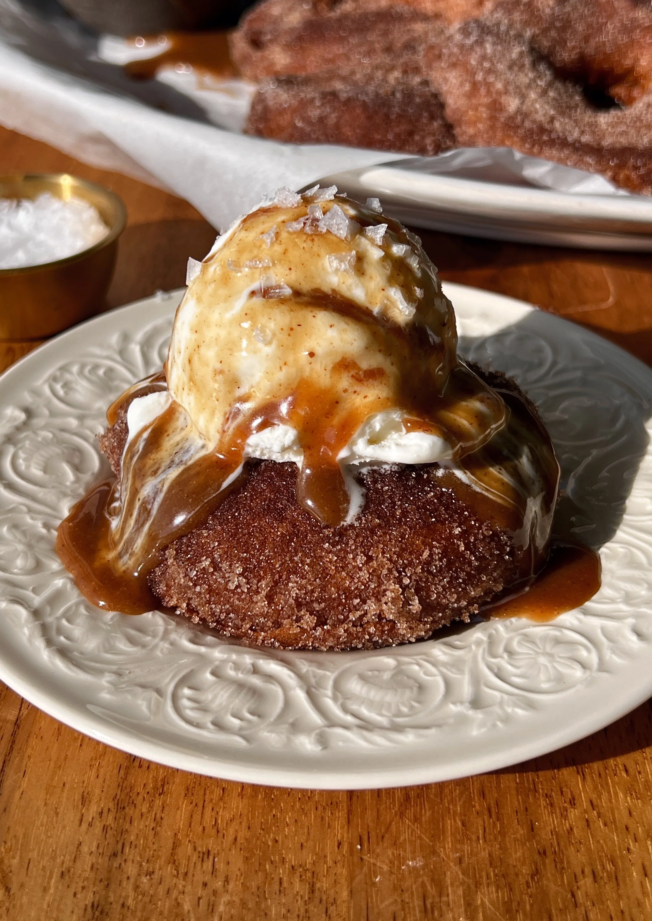 Perfectly golden and crisp sourdough buttermilk fried apple rings coated in cinnamon sugar served warm with an easy salted caramel dipping sauce as the ultimate cozy fall treat.