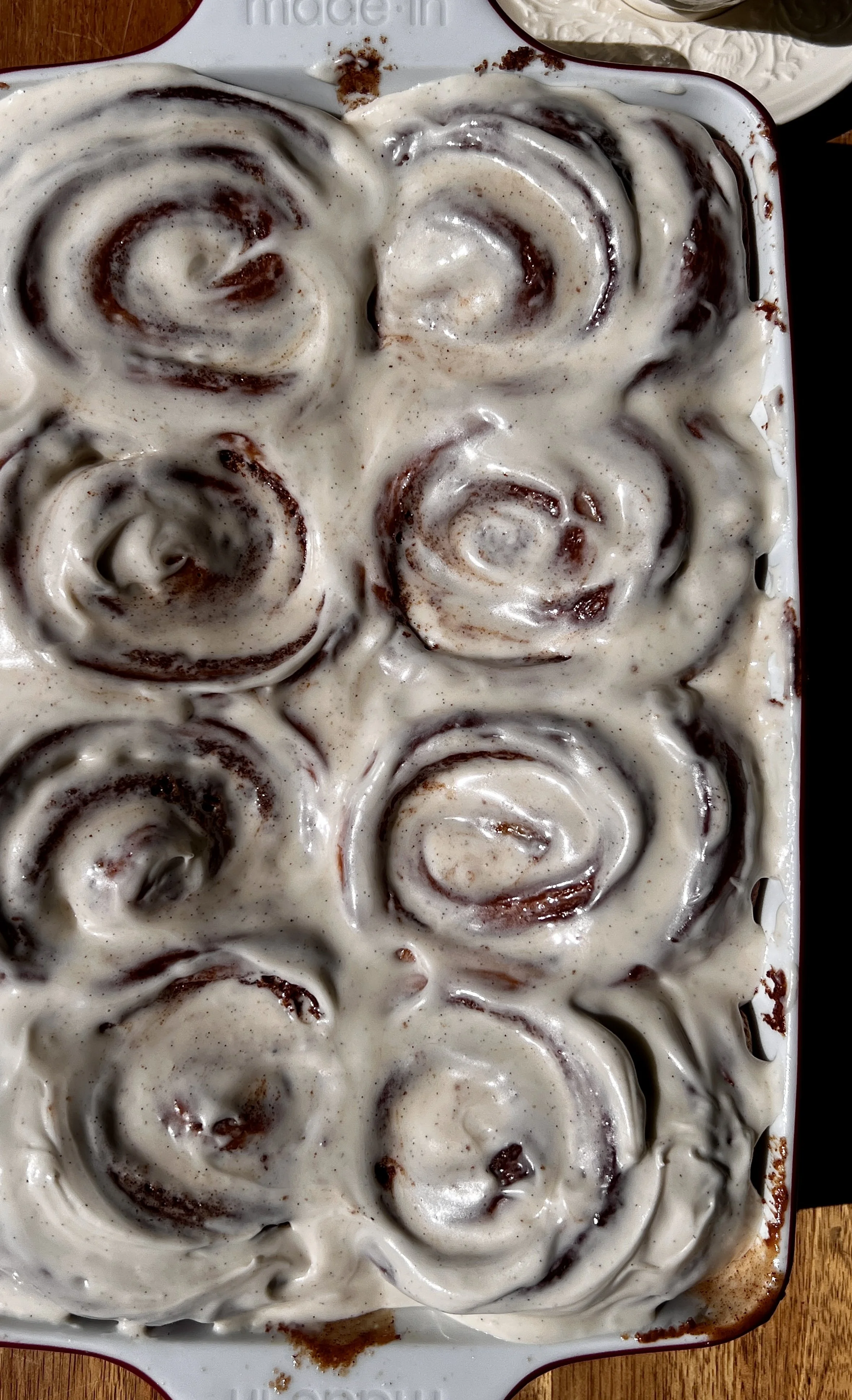 Perfect classic cinnamon rolls that are big, pillowy soft, and fluffy with a gooey cinnamon filling, topped with cream cheese frosting and served warm with coffee.