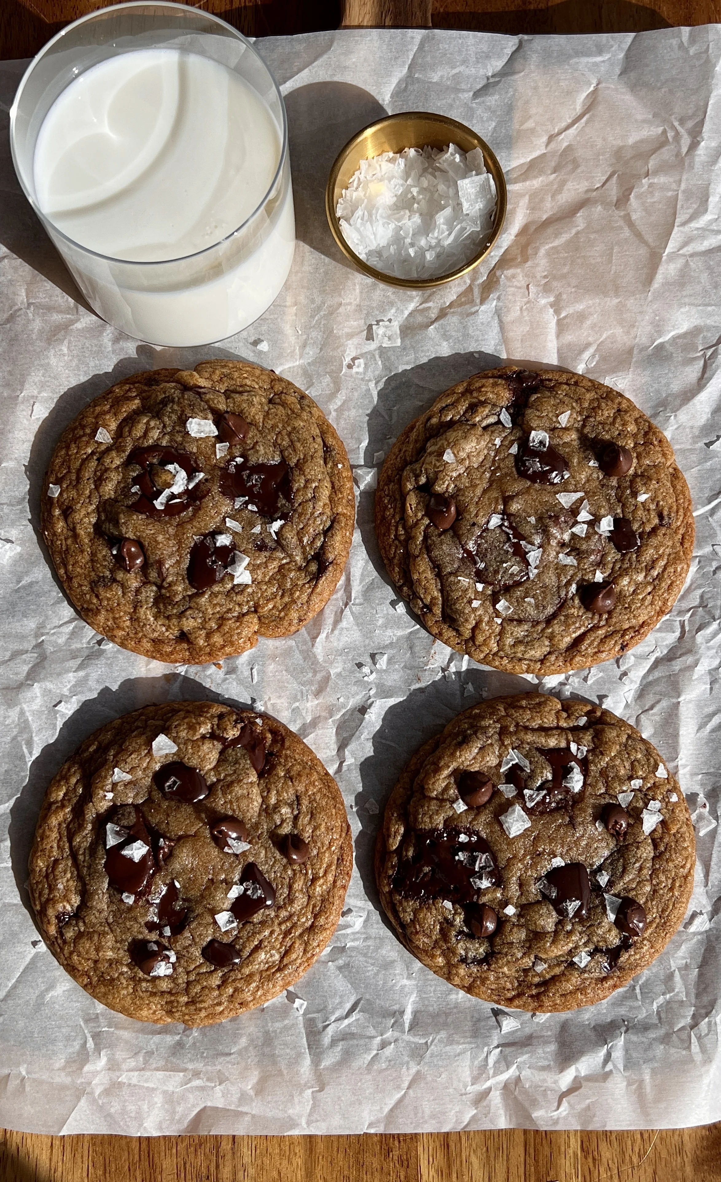 Nutella stuffed banana bread chocolate chip cookies with brown butter, crinkly edges, and flaky sea salt.