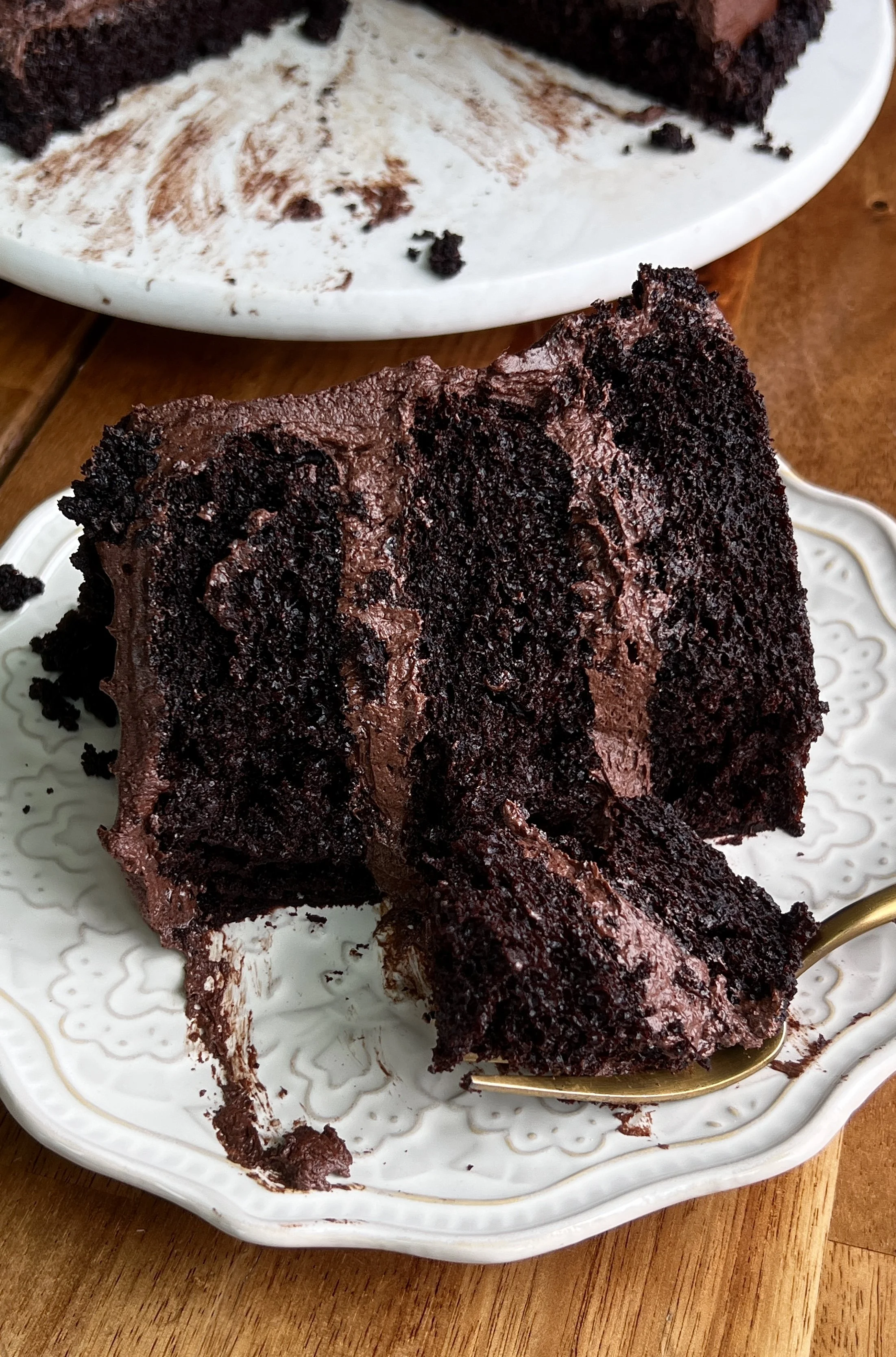 Classic chocolate layer cake served with smooth chocolate frosting and rich chocolate layers.