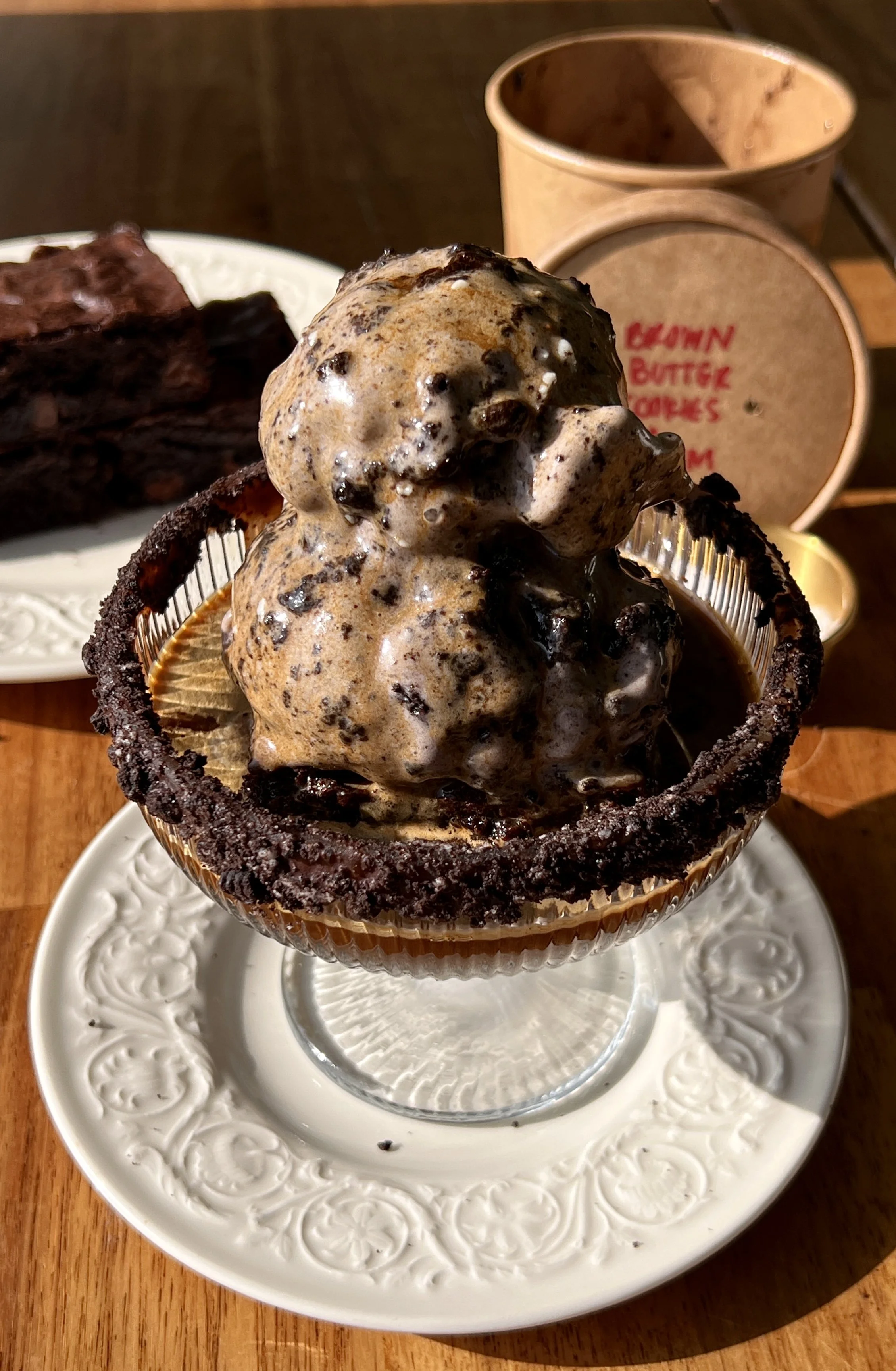 Rich and creamy brown butter cookies and cream ice cream made with an Oreo custard base served affogato-style over a warm brownie with a hot shot of espresso poured right over the top as the ultimate summer dessert.