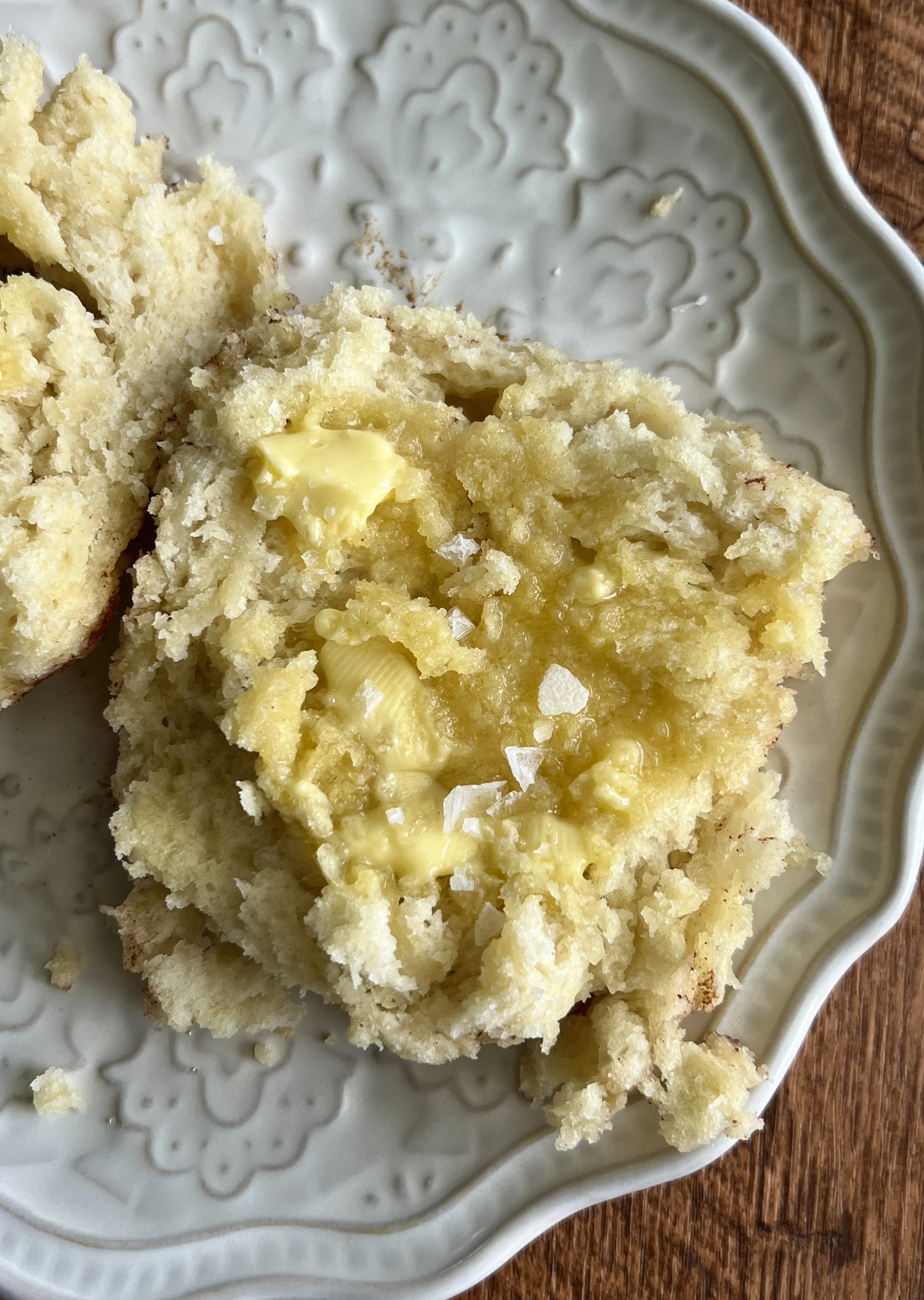 Fluffy, flaky, and buttery cinnamon crunch sourdough cathead biscuits made with sourdough discard, topped with crunchy cinnamon sugar, served with butter and flaky sea salt.