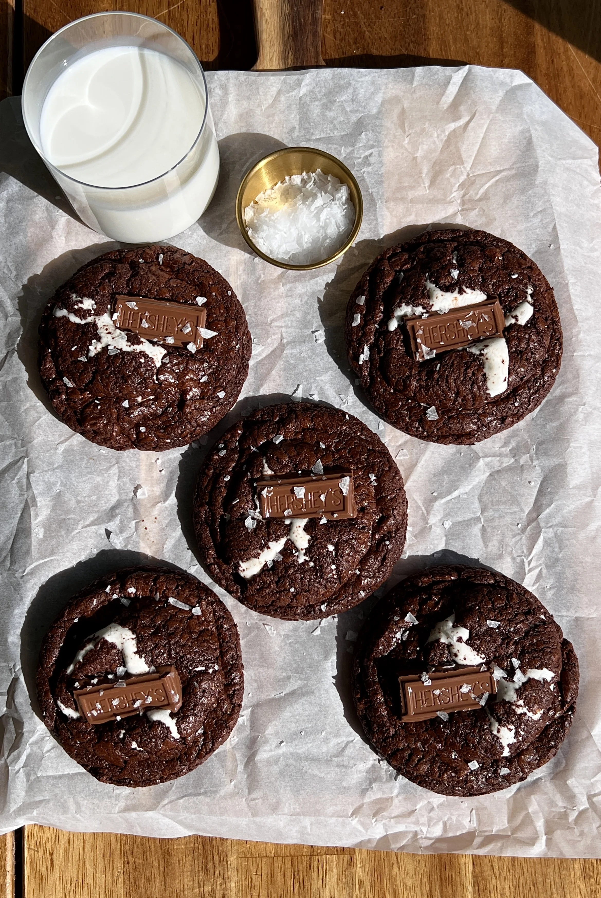 S’mores brownie cookies with crinkle tops, graham cracker bottoms, melty chocolate, and gooey marshmallow centers.
