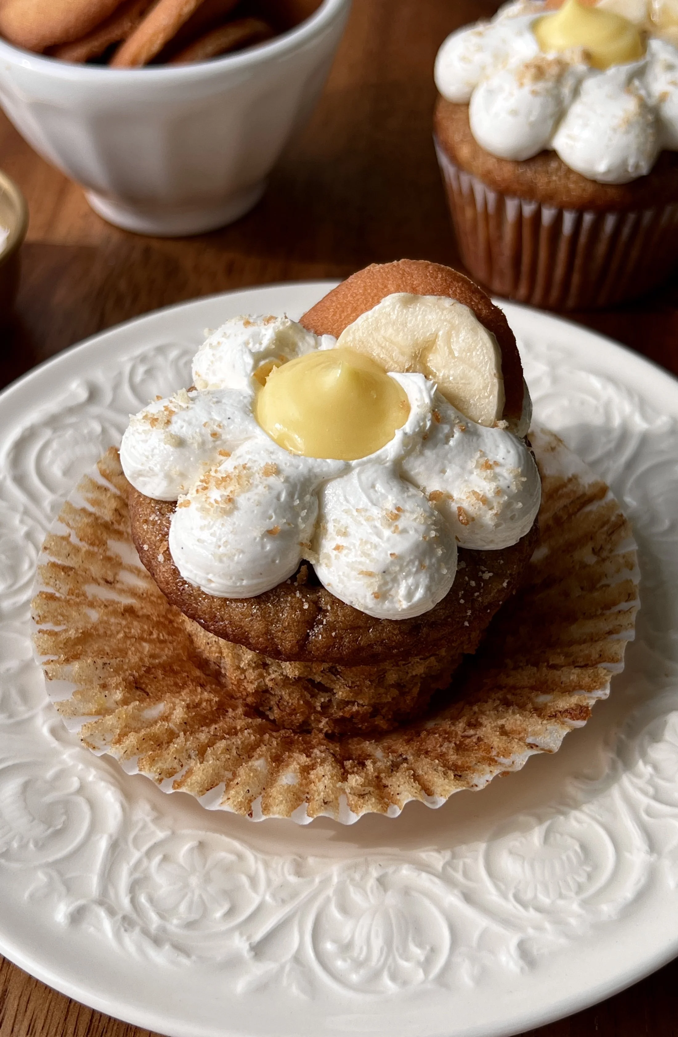 Brown butter banana pudding cupcakes topped with whipped buttercream and crushed Nilla wafers.