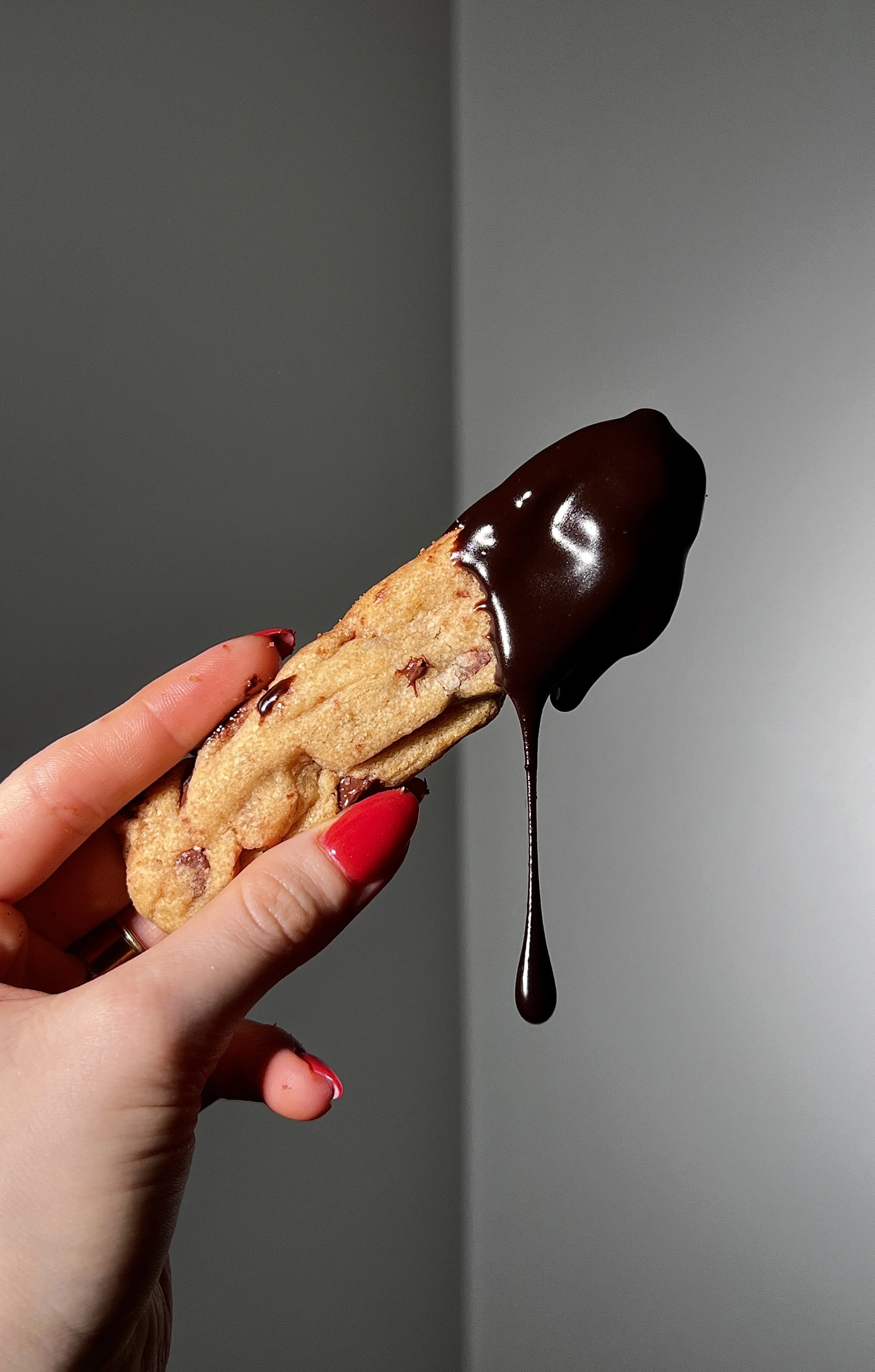 Brown butter chocolate chip cookie fries with crisp edges and melty chocolate chips, served warm with hot fudge sauce and flaky sea salt.