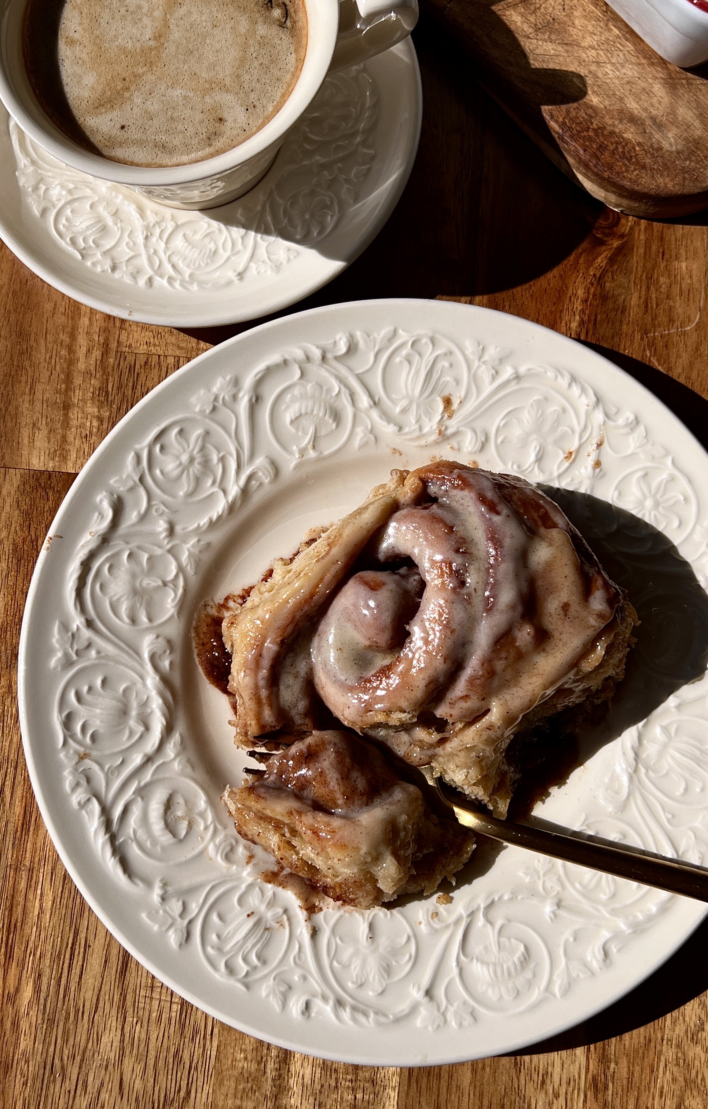 Soft, fluffy, and perfectly gooey brown butter buttermilk cinnamon rolls with beautifully golden edges and a warming brown butter cinnamon filling finished with smooth brown butter cream cheese frosting served warm with a hot cup of coffee.