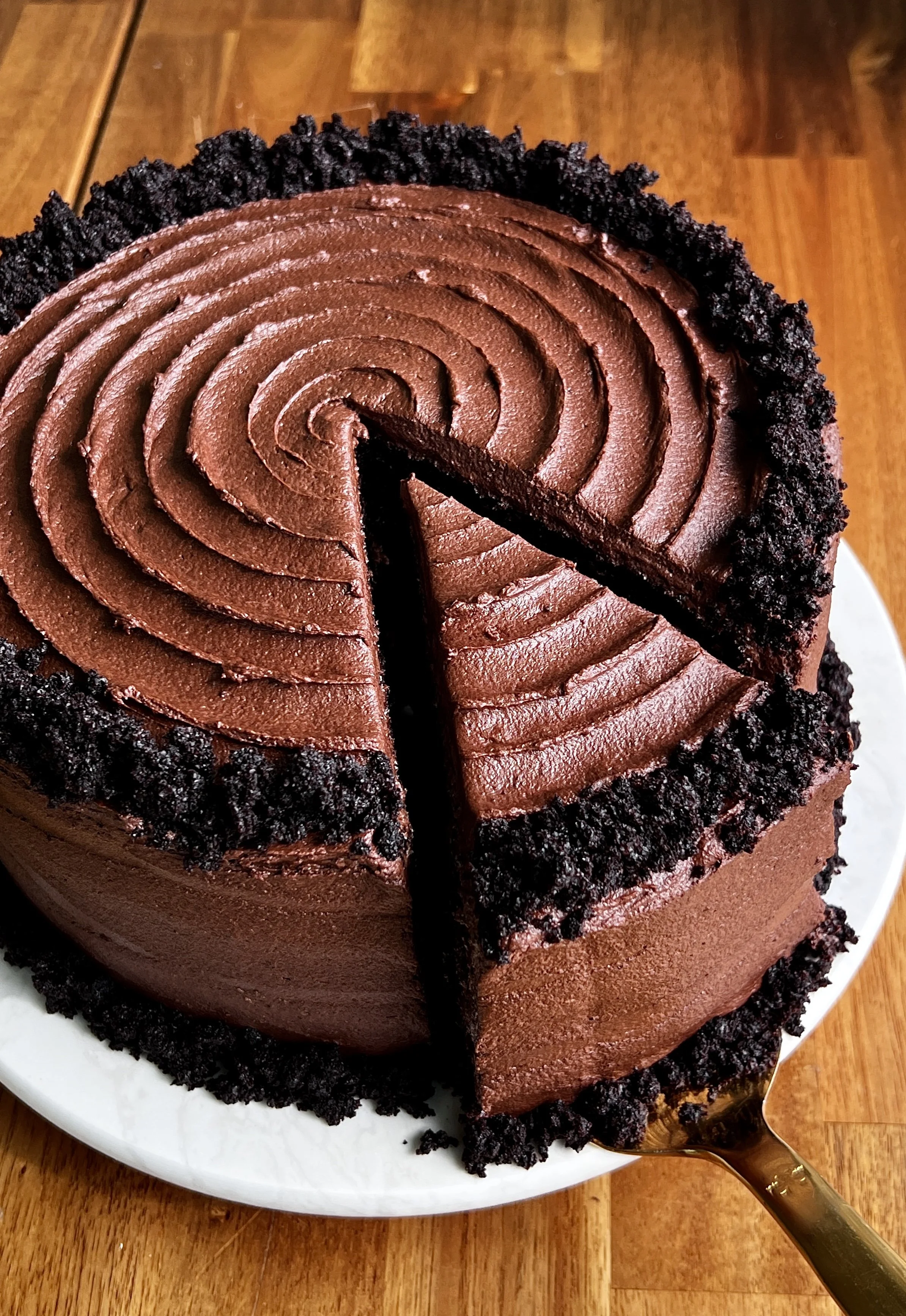 Classic chocolate layer cake served with smooth chocolate frosting and rich chocolate layers.