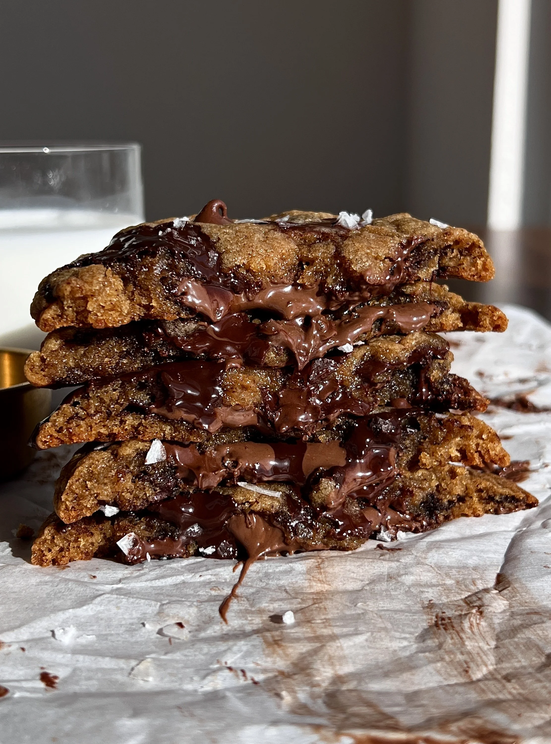 Soft and gooey Nutella stuffed banana bread cookies with golden crisp edges and melted chocolate chips.