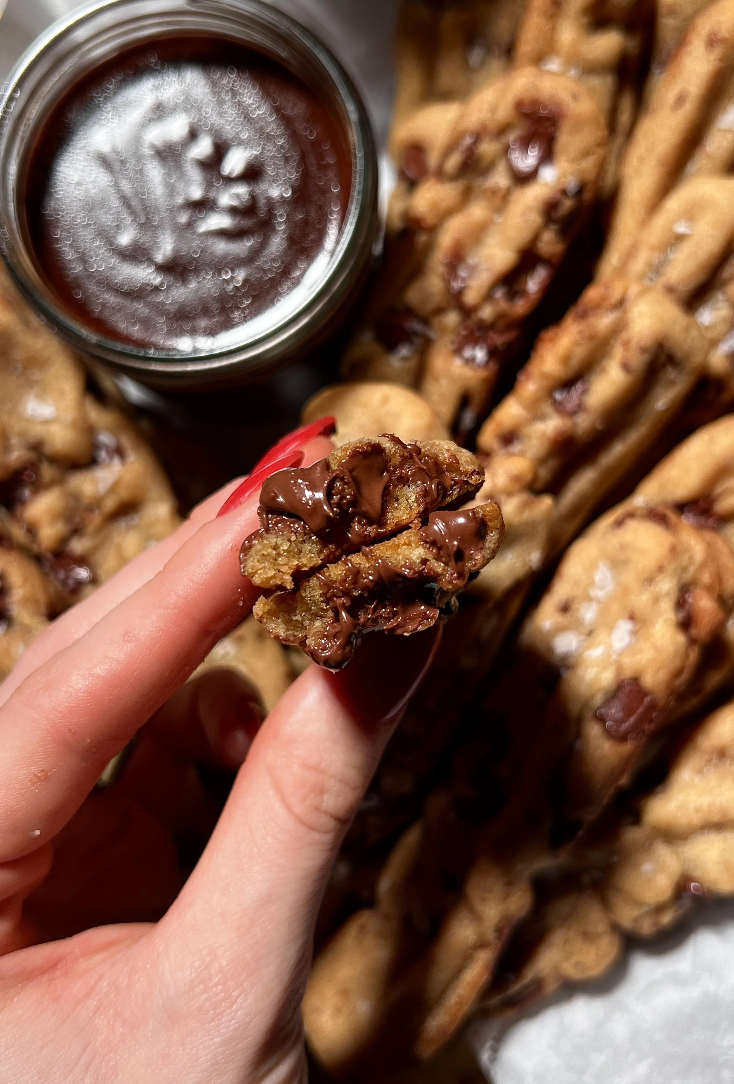 Brown butter chocolate chip cookie fries with crisp edges and melty chocolate chips, served warm with hot fudge sauce and flaky sea salt.