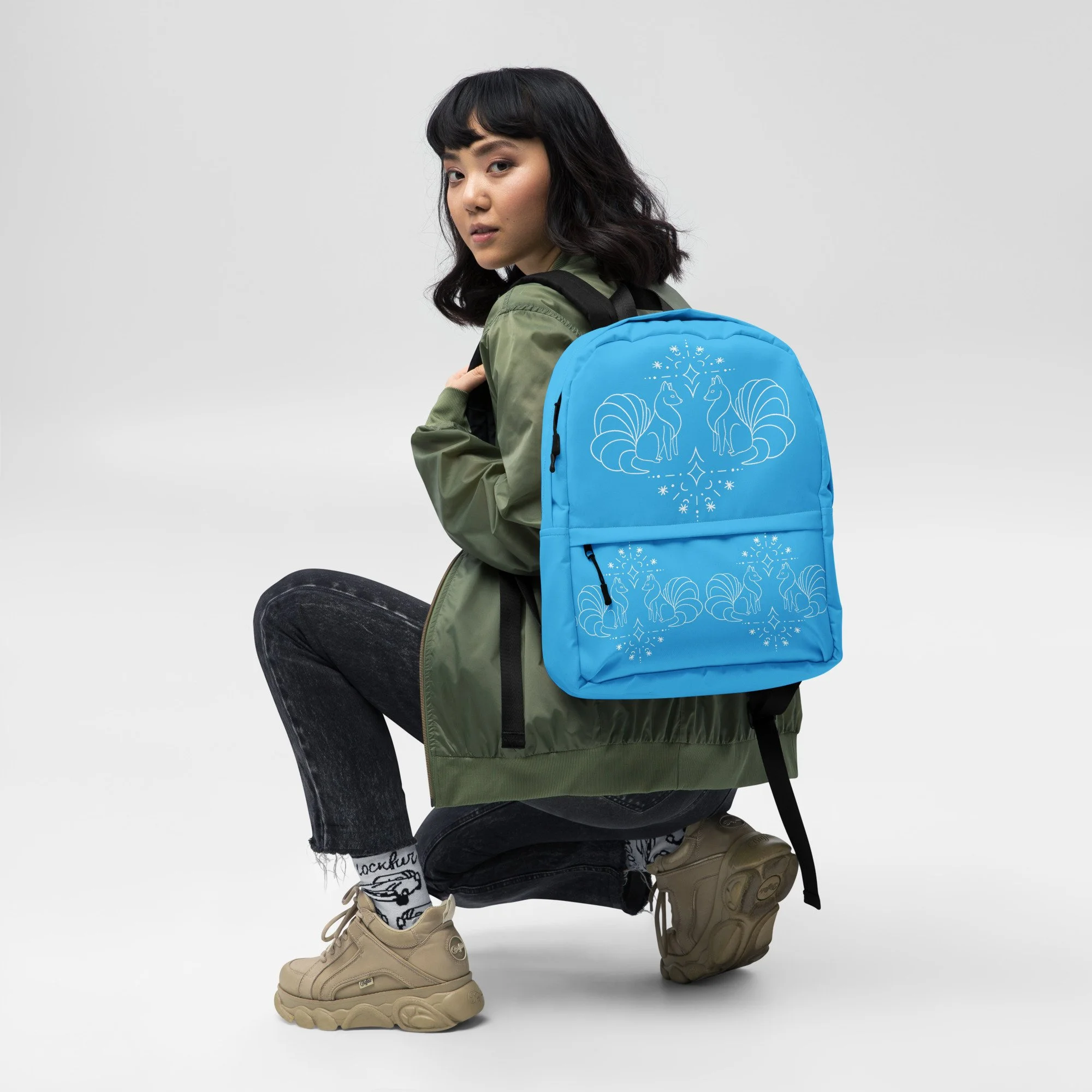 all-over-print-backpack-white-front-68a6437a880b6.jpg