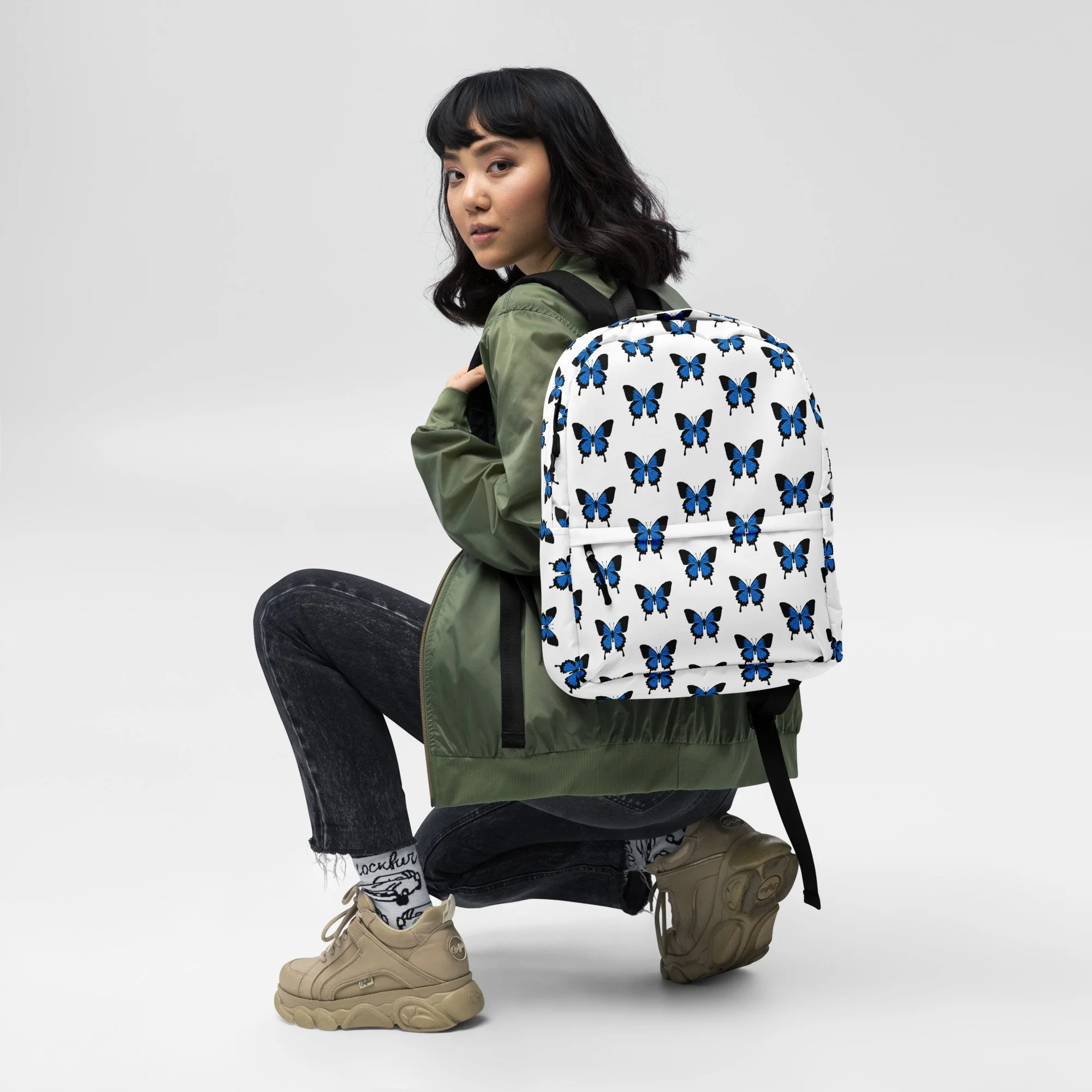 all-over-print-backpack-white-front-68a784747c4b8.jpg