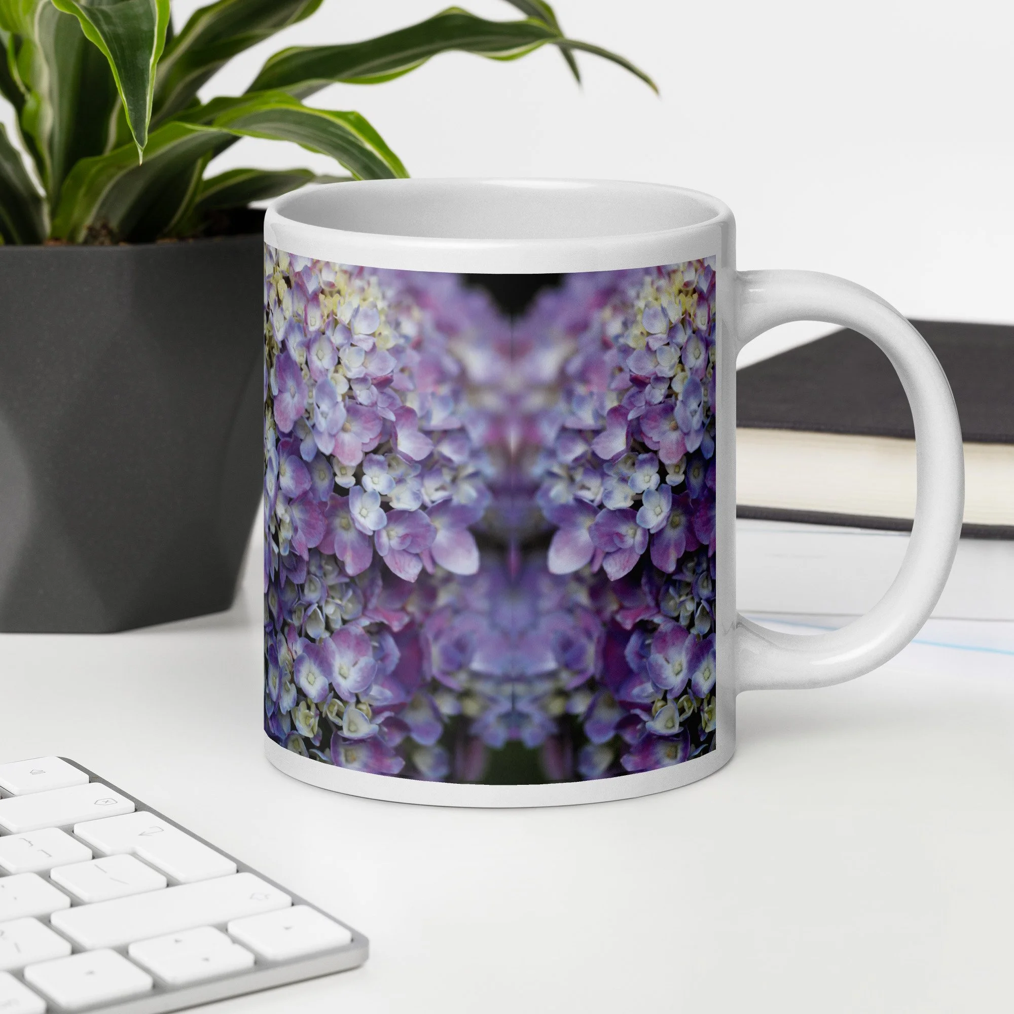 white-glossy-mug-white-20-oz-office-environment-69d31f338bfa4.jpg