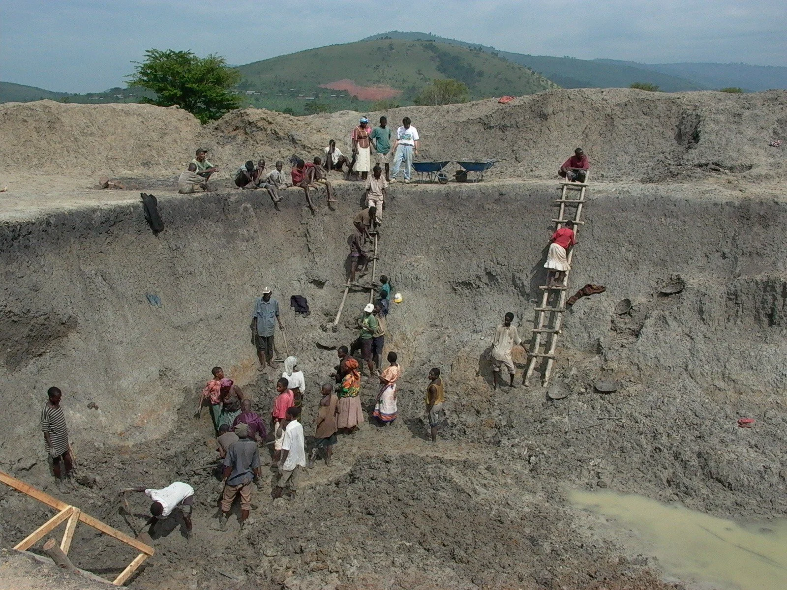 community and dad moving mud.jpg