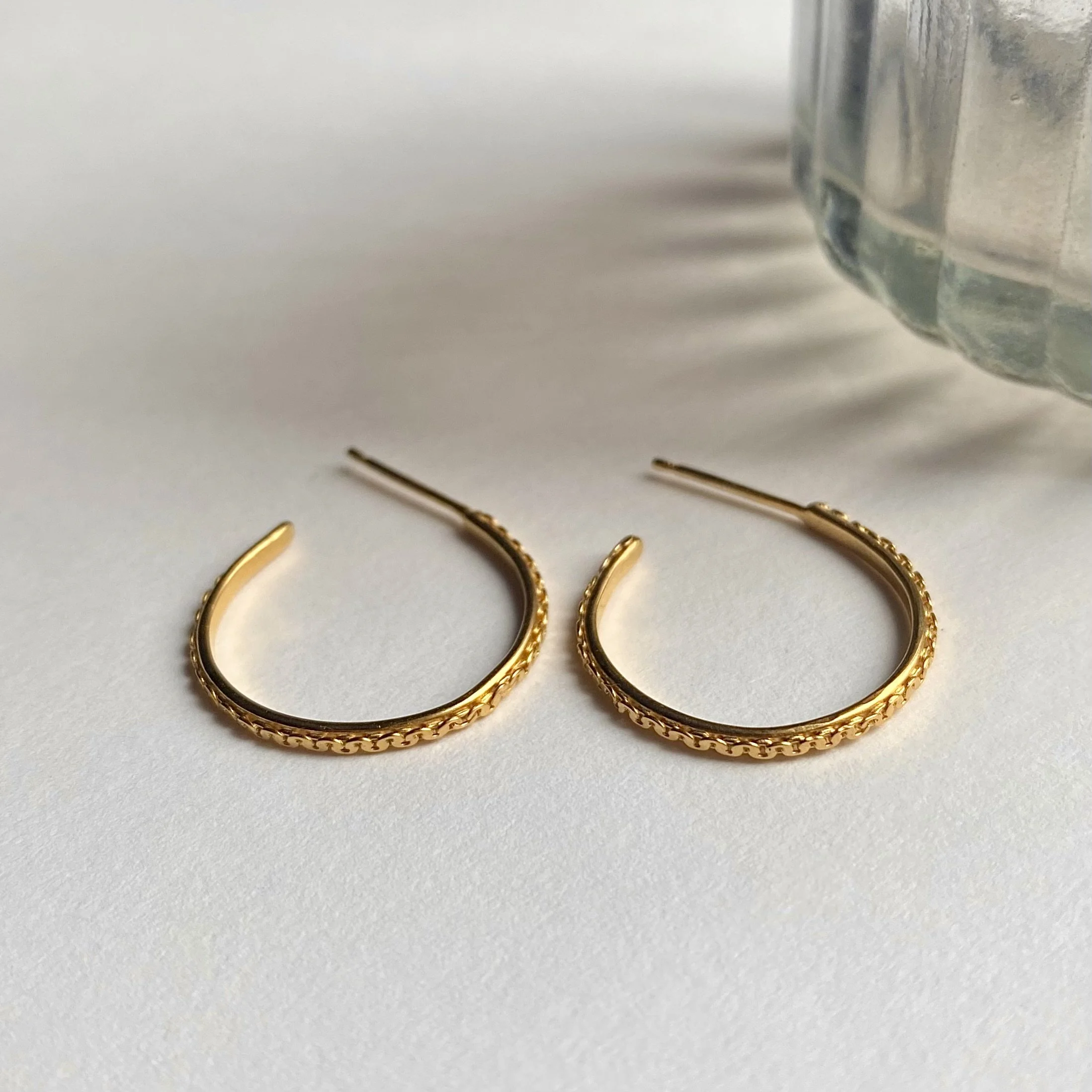 Gold plates large chain hoops white.jpeg