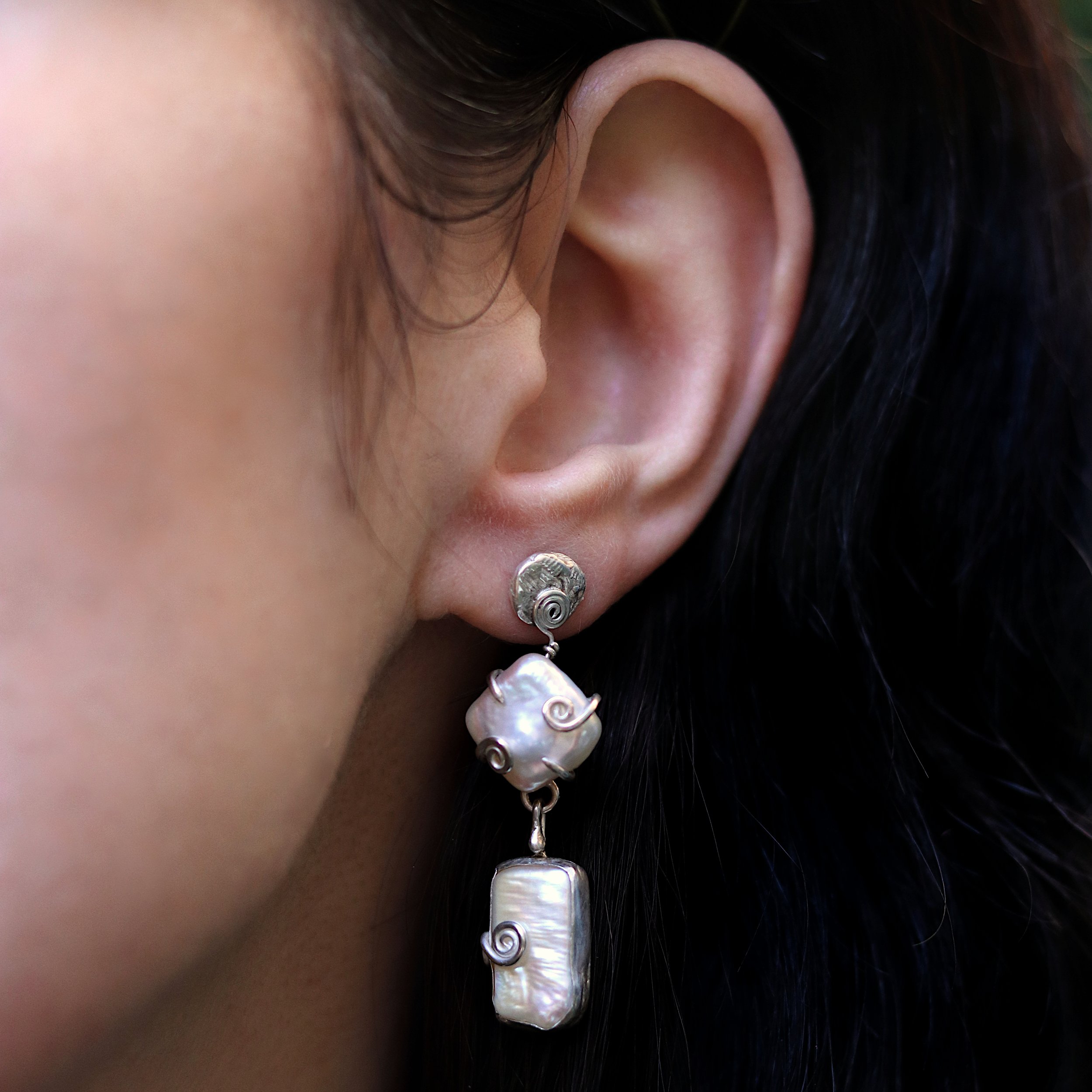 Mismatched statement pearl drop earrings model crop.jpg