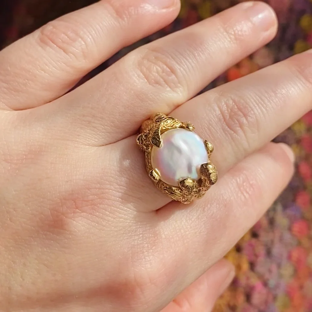 Gold molten pearl claw ring on hand2.jpg