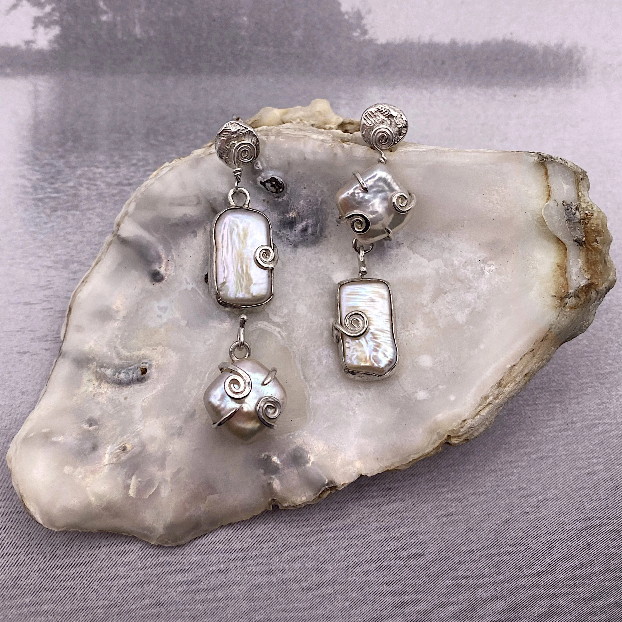 Mismatched statement pearl drop earrings crop.jpg