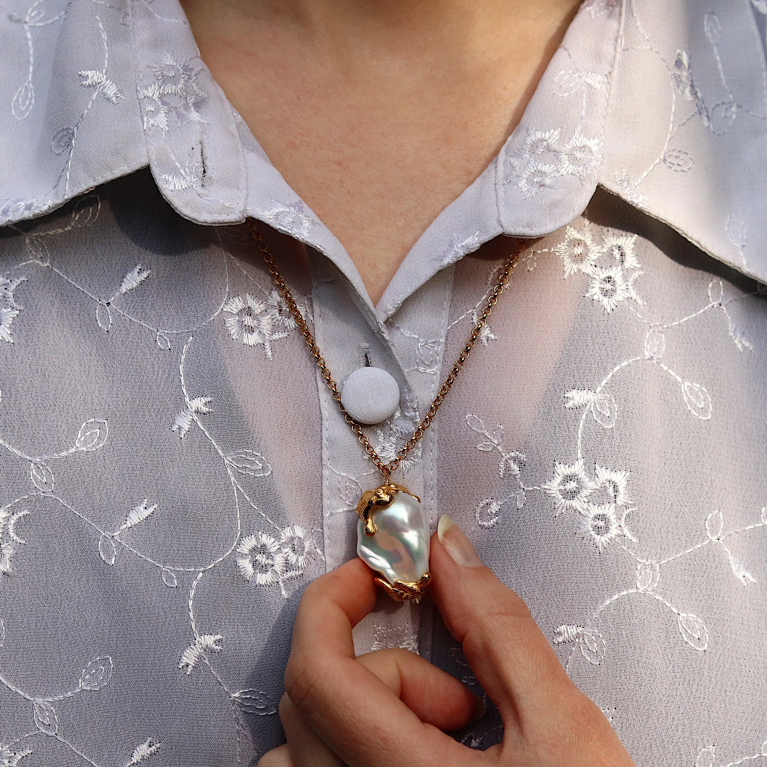 Large Molten Golden Pearl Necklace model crop.jpg