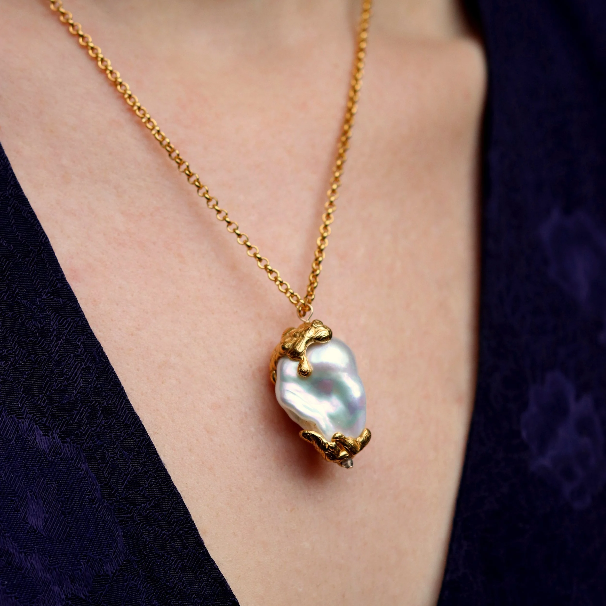 Large Molten Golden Pearl Necklace model.jpg