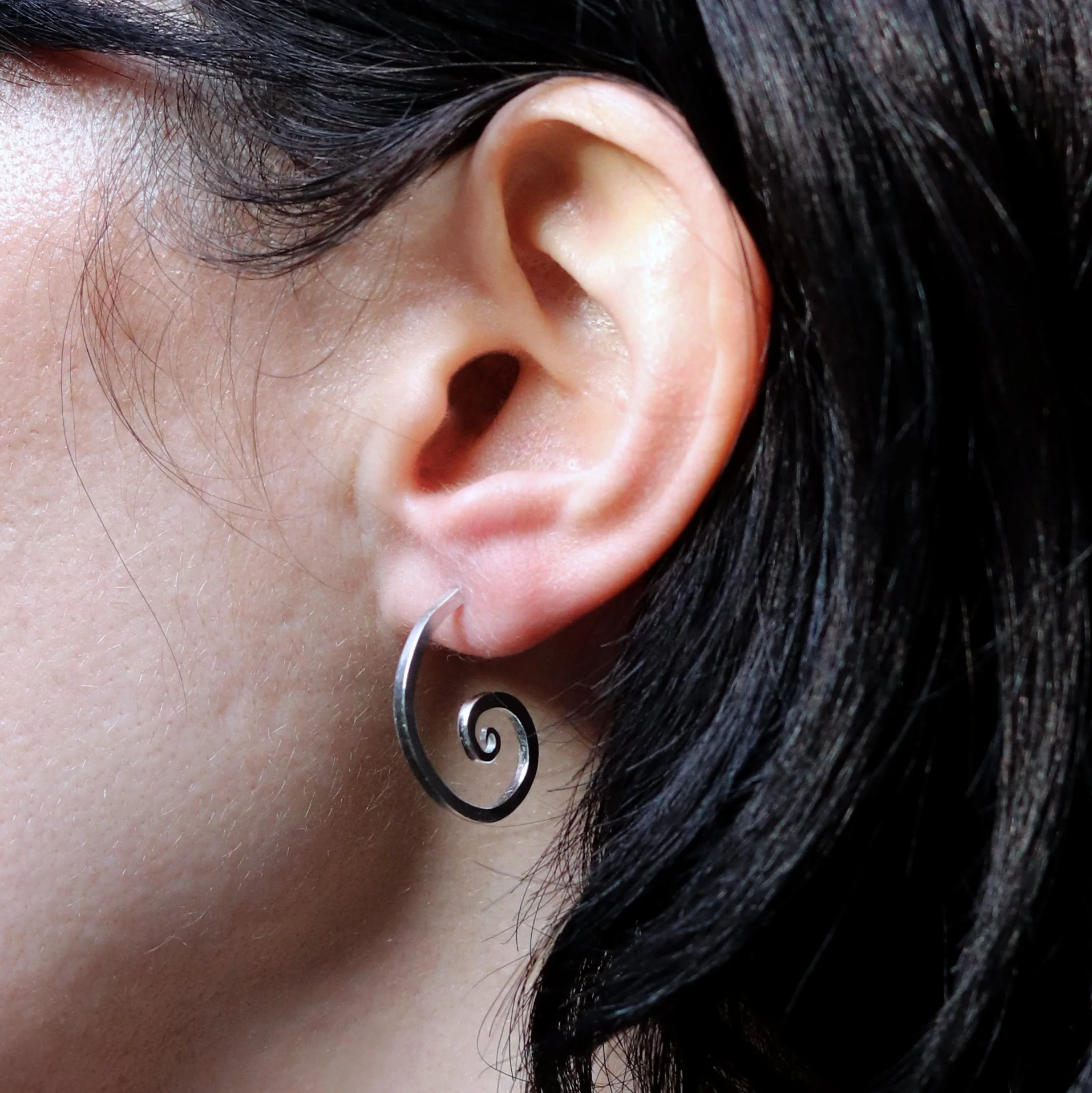 square profile spiral hoop on ear.jpg