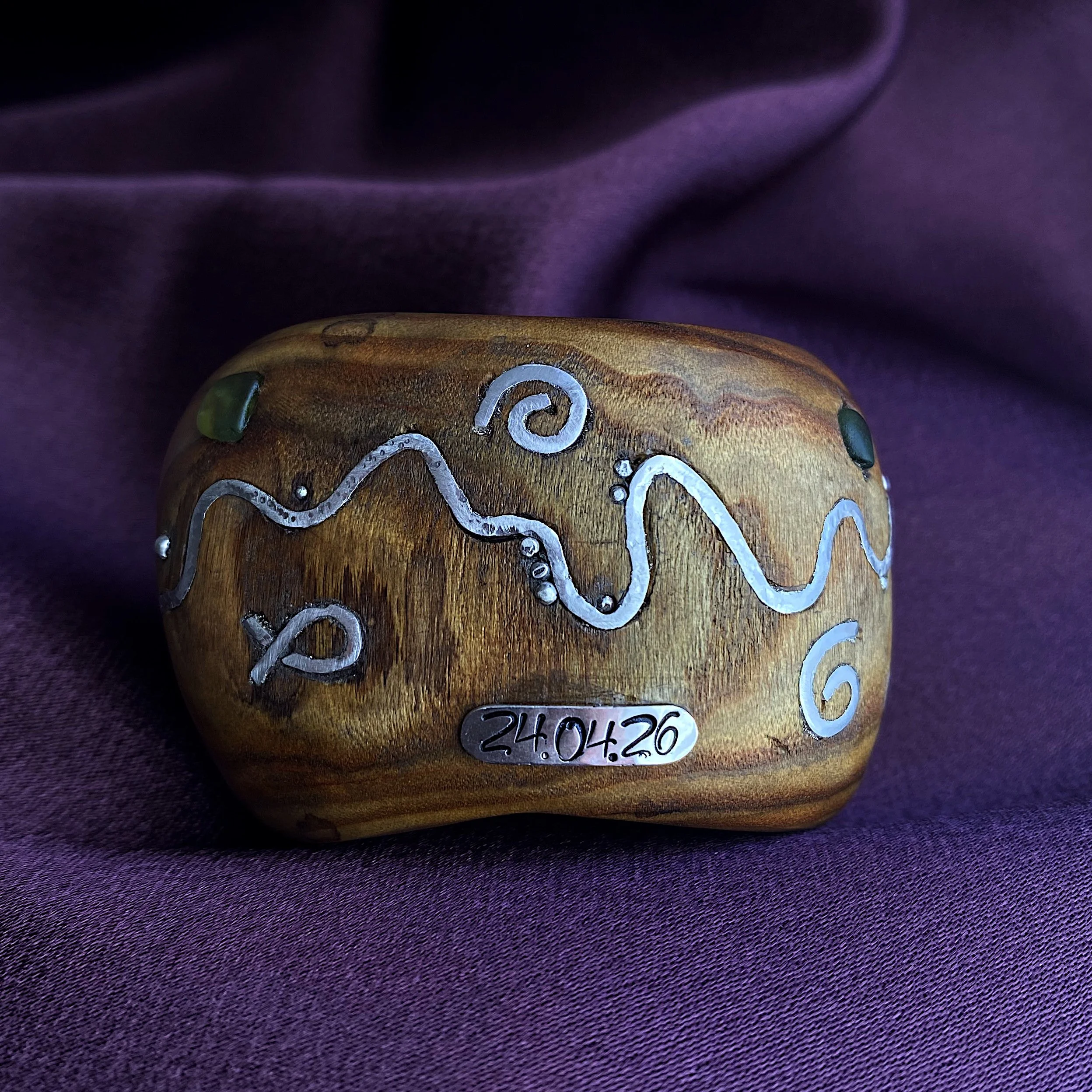 Wooden napkin ring with silver and sea glass inlay