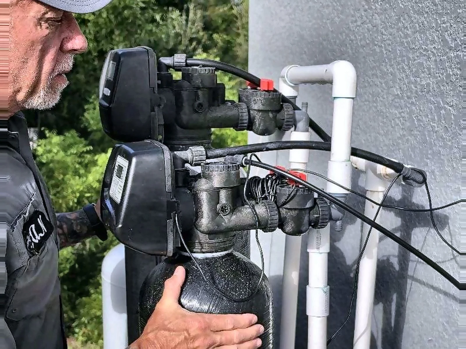Twin control valves on a residential water softener in Charlotte County, FL