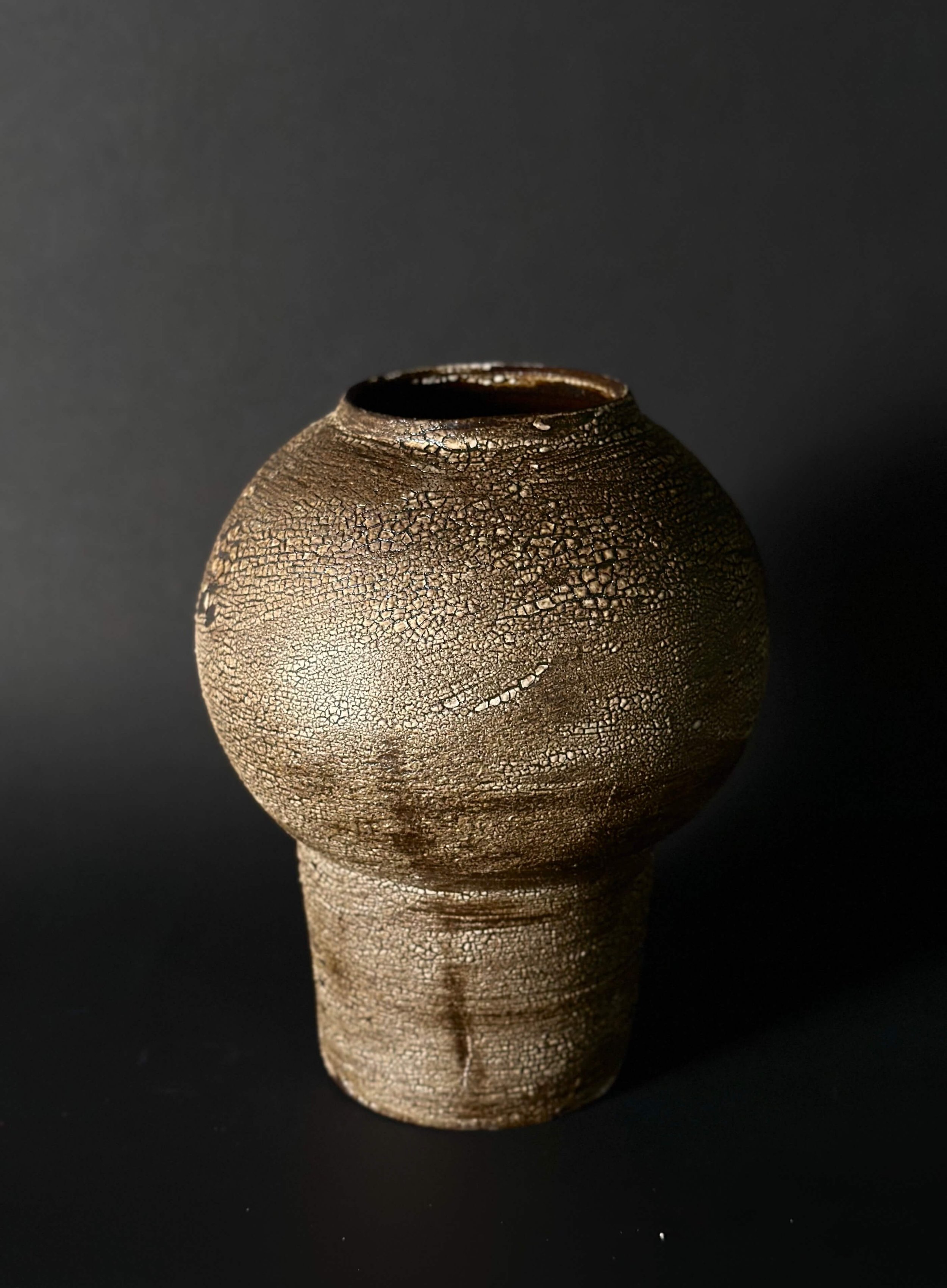 wabi-sabi decor, minimalist home decor, timeless organic design, raw earthy textures, medium sculptural vessel, earthy ceramic vase, artisanal homeware for designers, sustainable handcrafted ceramics