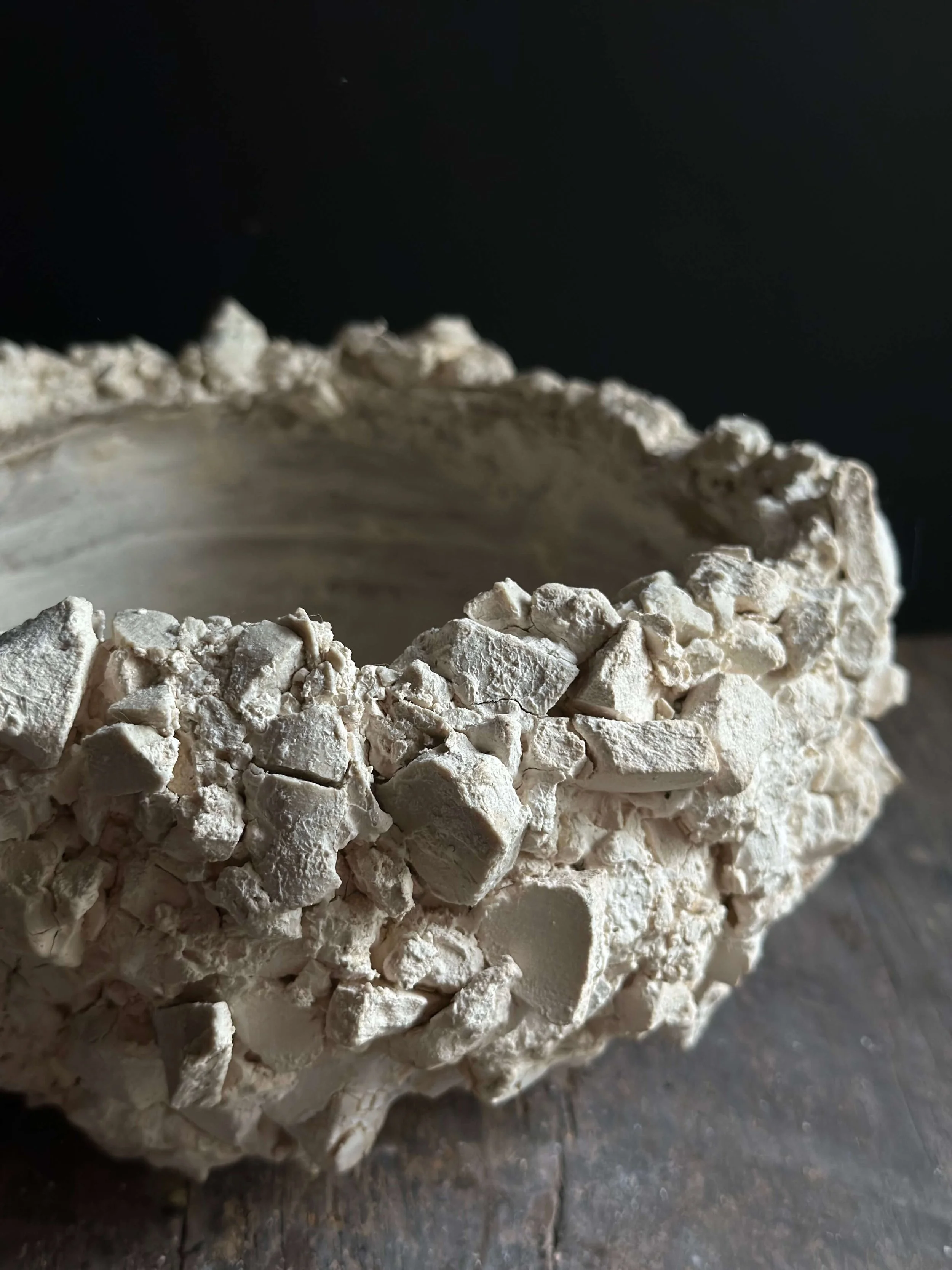 Wide shallow bowl with chunky rough crawl-glaze exterior