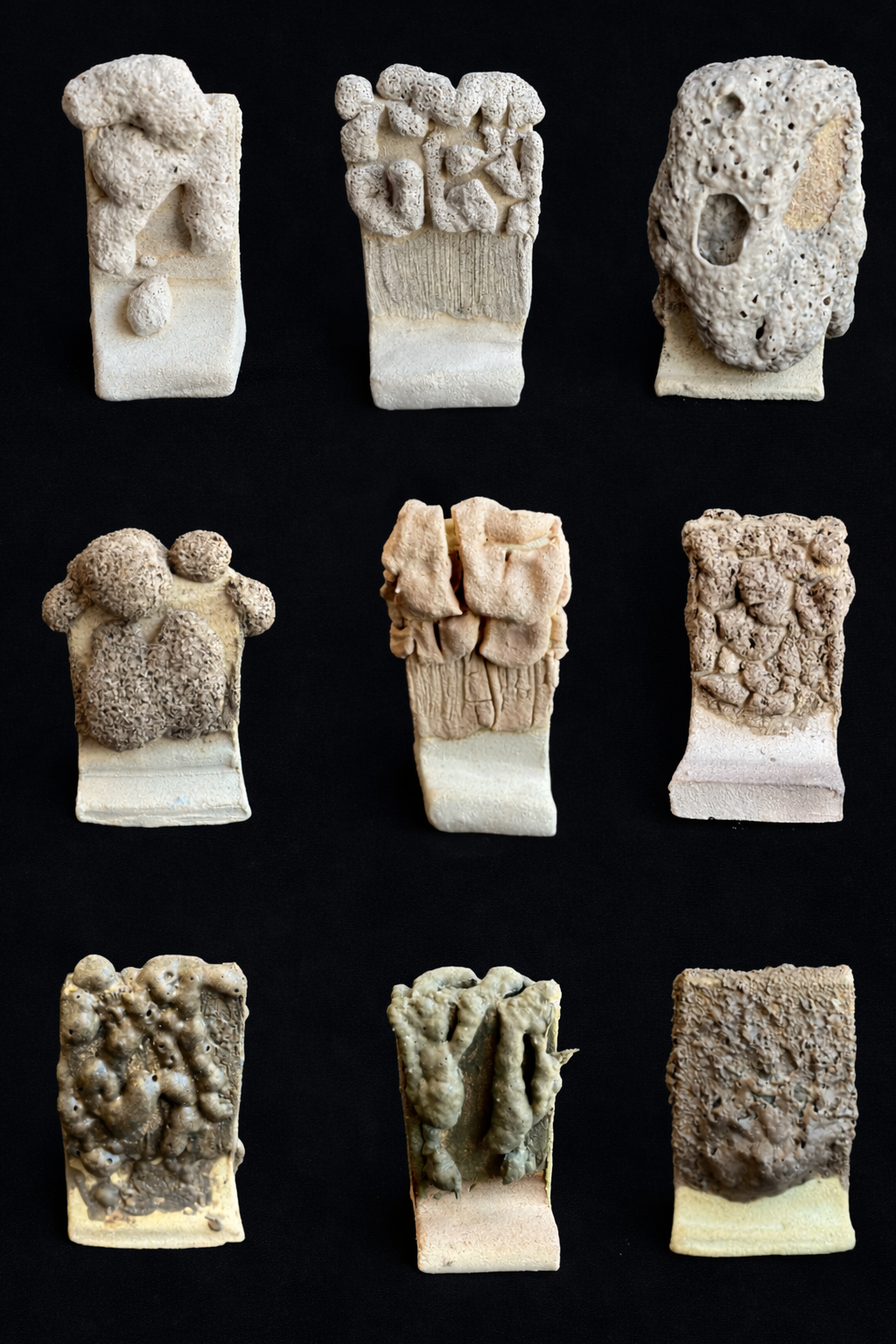Underfired lava glaze surfaces from a ceramics workshop — crawl glaze and special effect ceramic textures