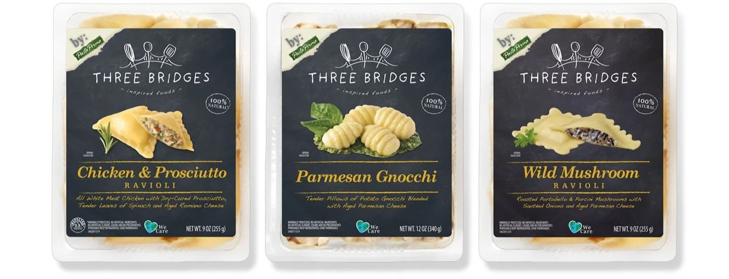 Three packages of Three Bridges inspired foods ravioli, from left to right: Chicken & Prosciutto, Parmesan Gnocchi, and Wild Mushroom.
