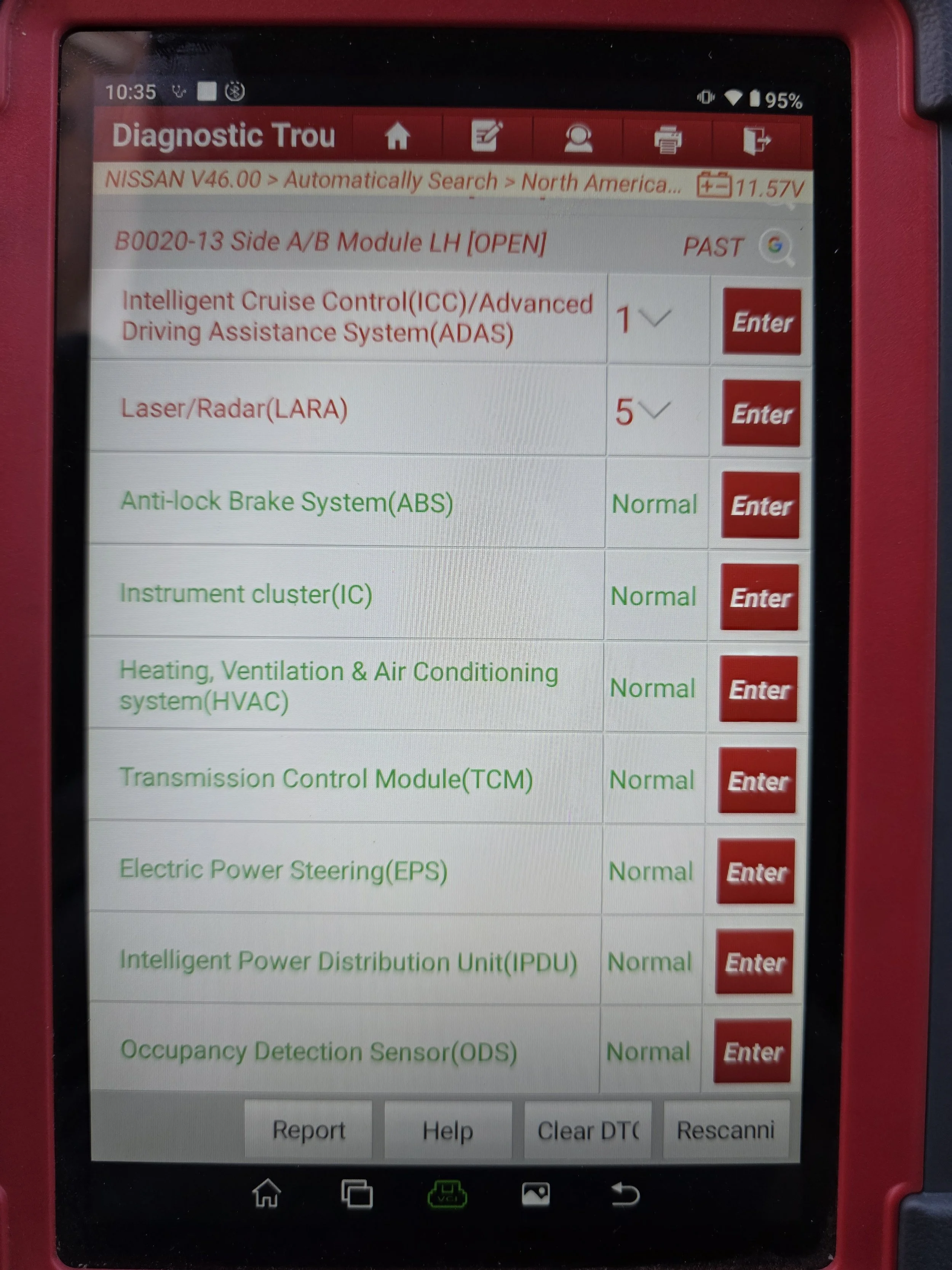 Automotive diagnostic scan tool displaying various system statuses including ABS, IC, HVAC, TCM, EPS, IPDU, and ODS, with some marked as normal and others needing attention.