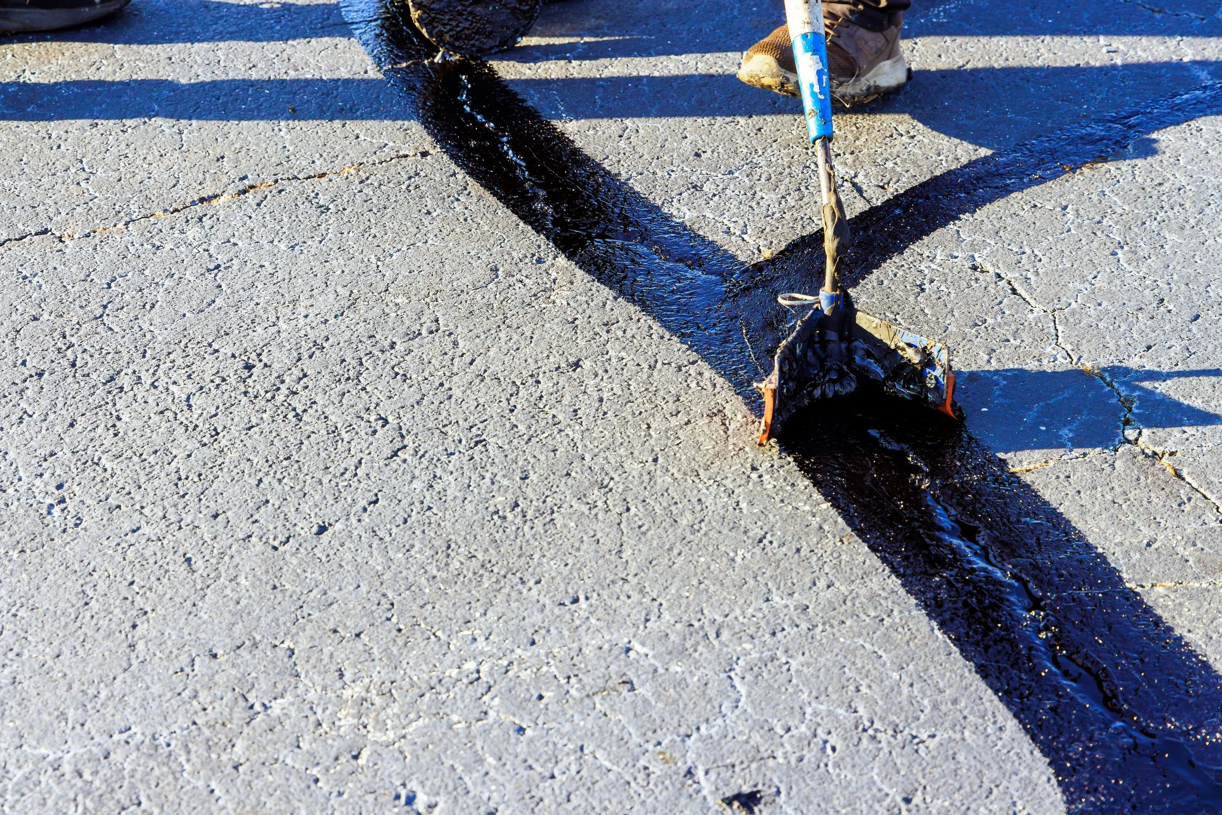 Hot Tar Crack Sealing: The First Line of Defense for Your Asphalt