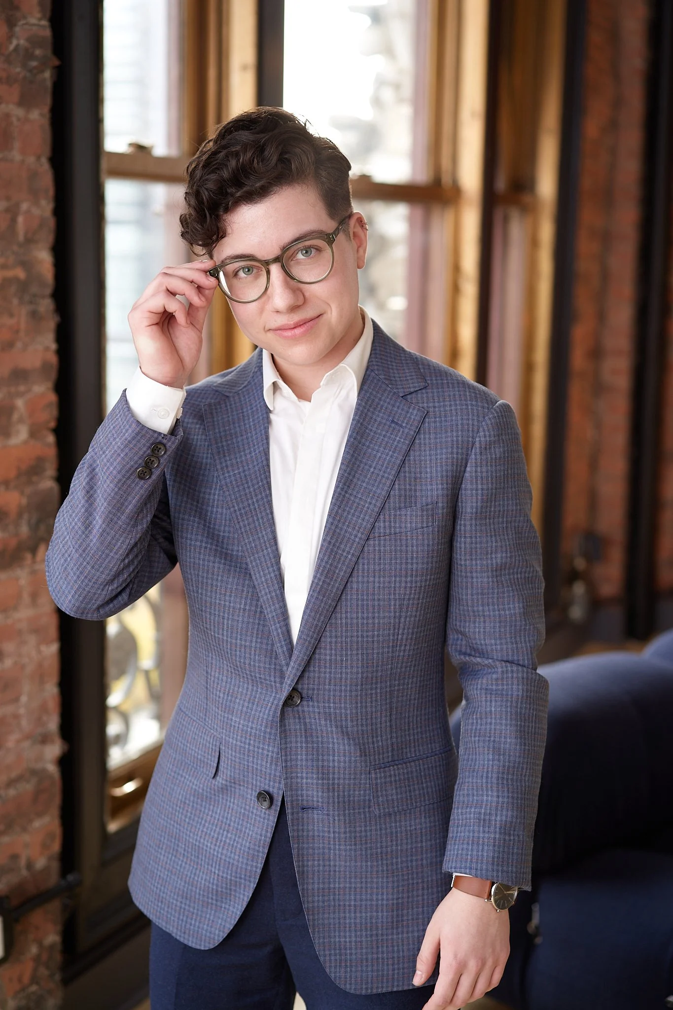 investment firm professional headshot shot with natural window light in a warm interior location in New York City