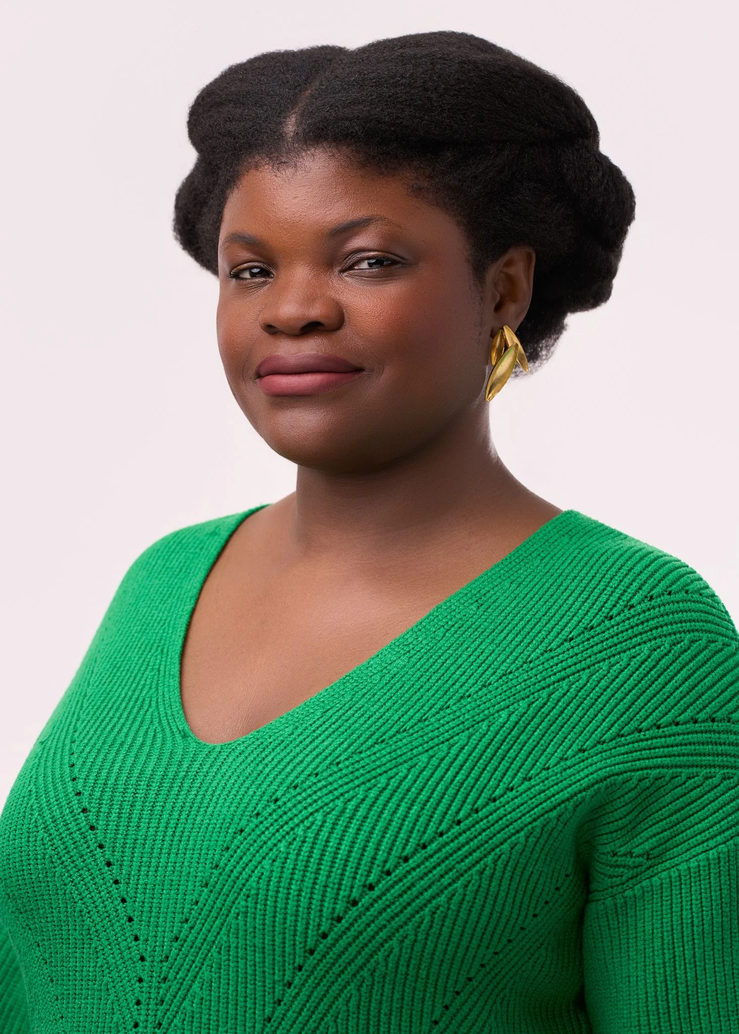 Corporate photography blog image of women’s wardrobe styling for headshots in NYC, featuring solid colors and minimal accessories.