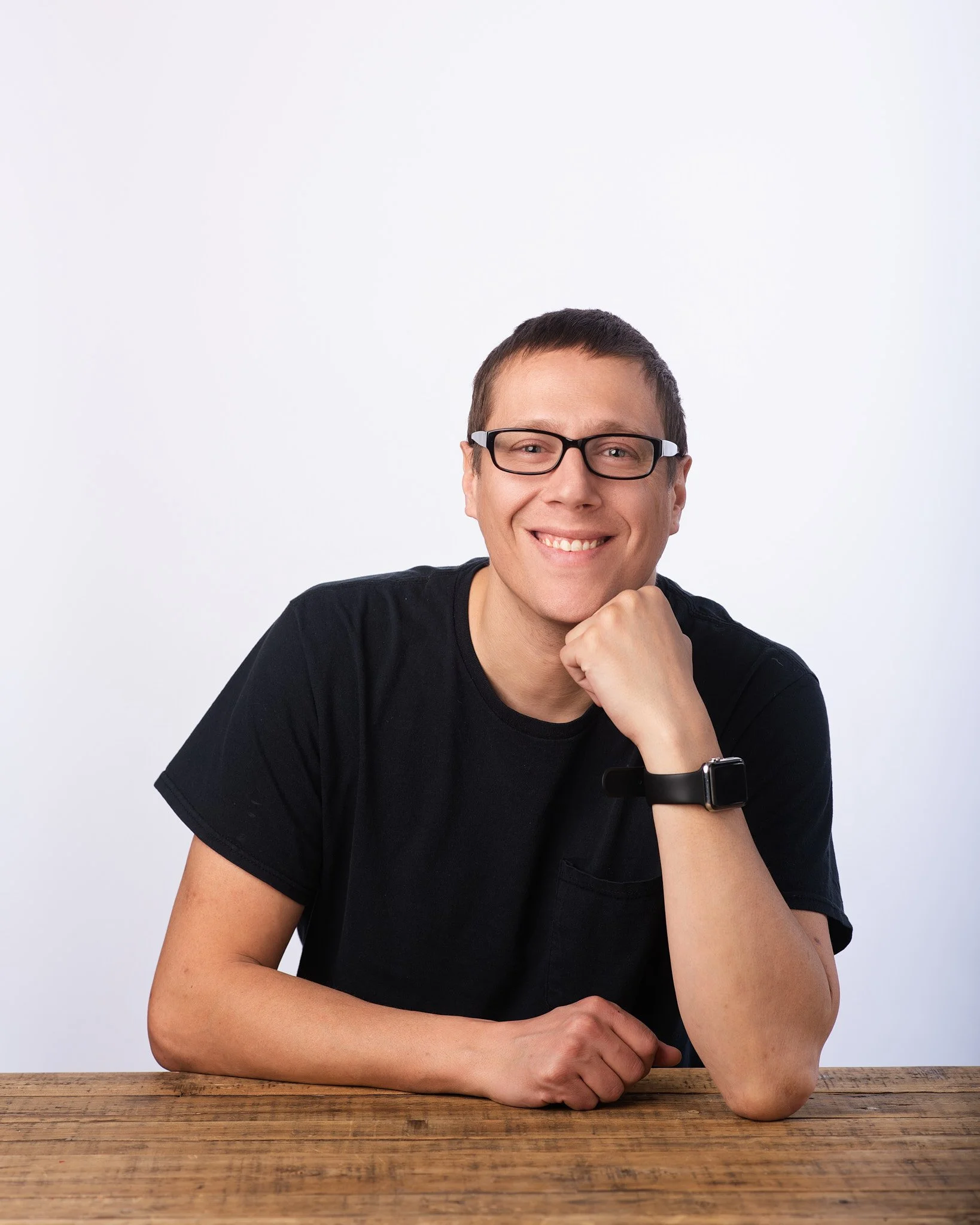 Professional headshot captured by NYC corporate photographer showcasing approachable and consistent lighting