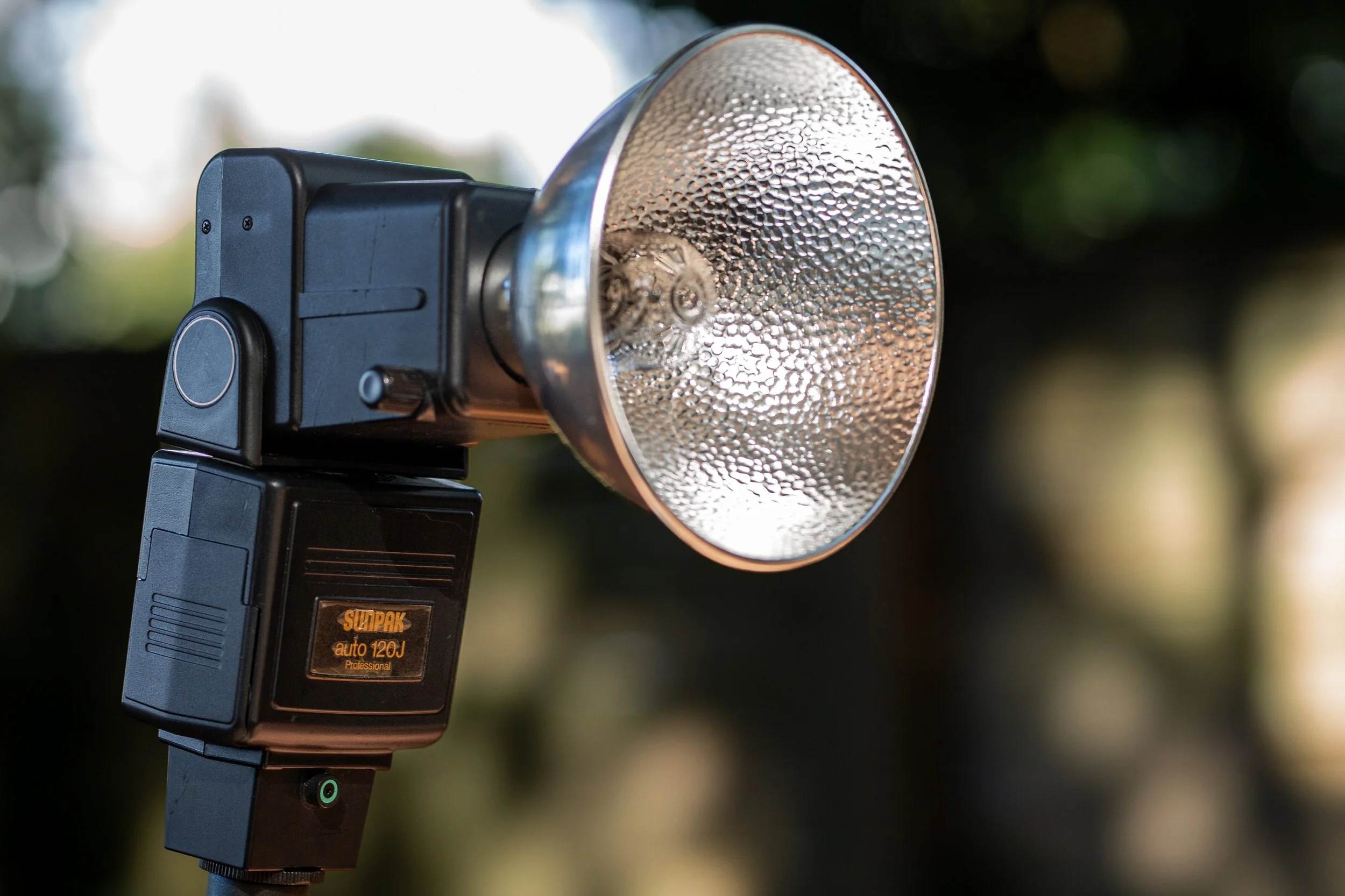 Sunpak 120J AutoPro bare-bulb flash unit mounted on a stand, full product shot