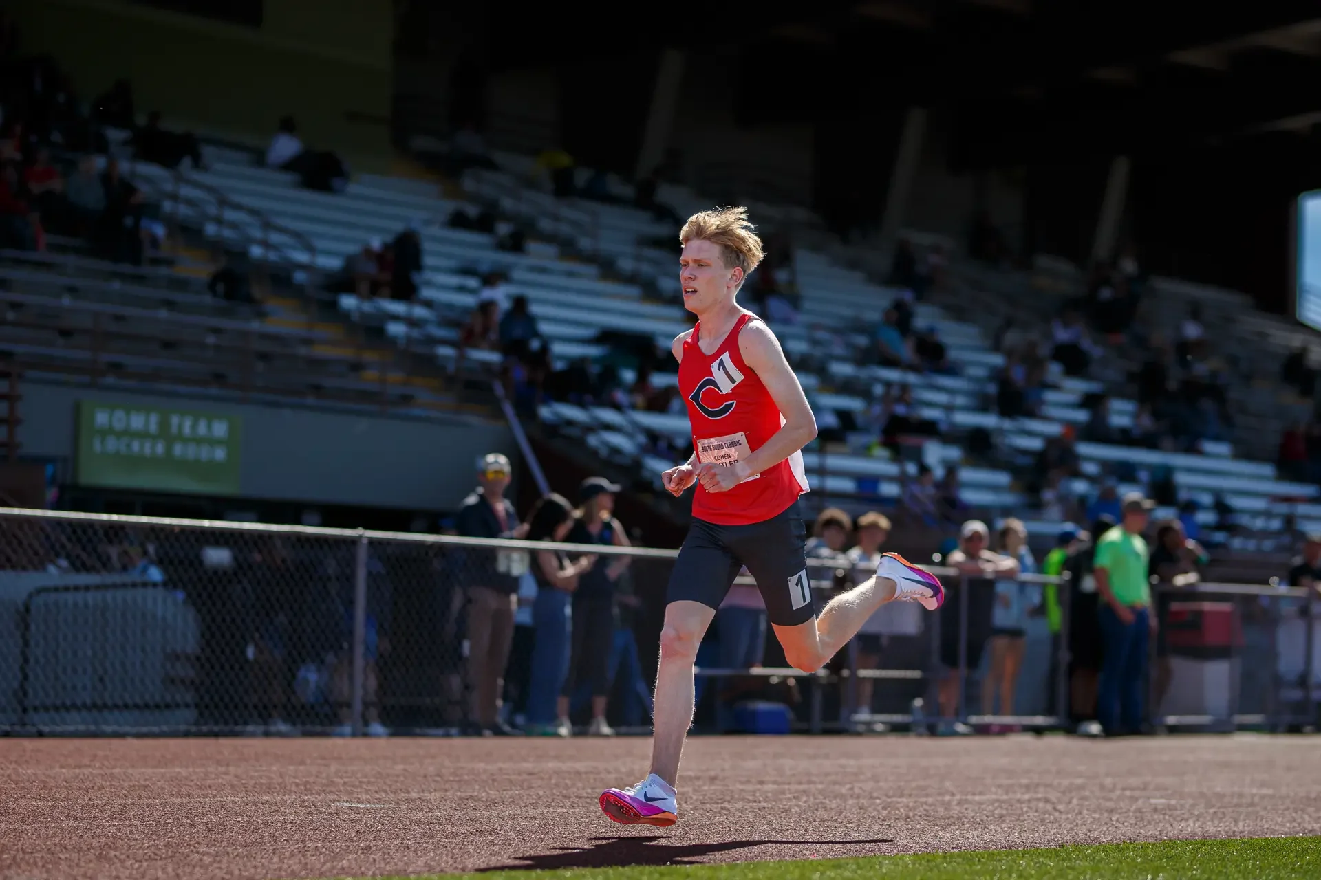 Cohen Butler setting a meet record at Sparks Stadium by Russell Moore Photography.