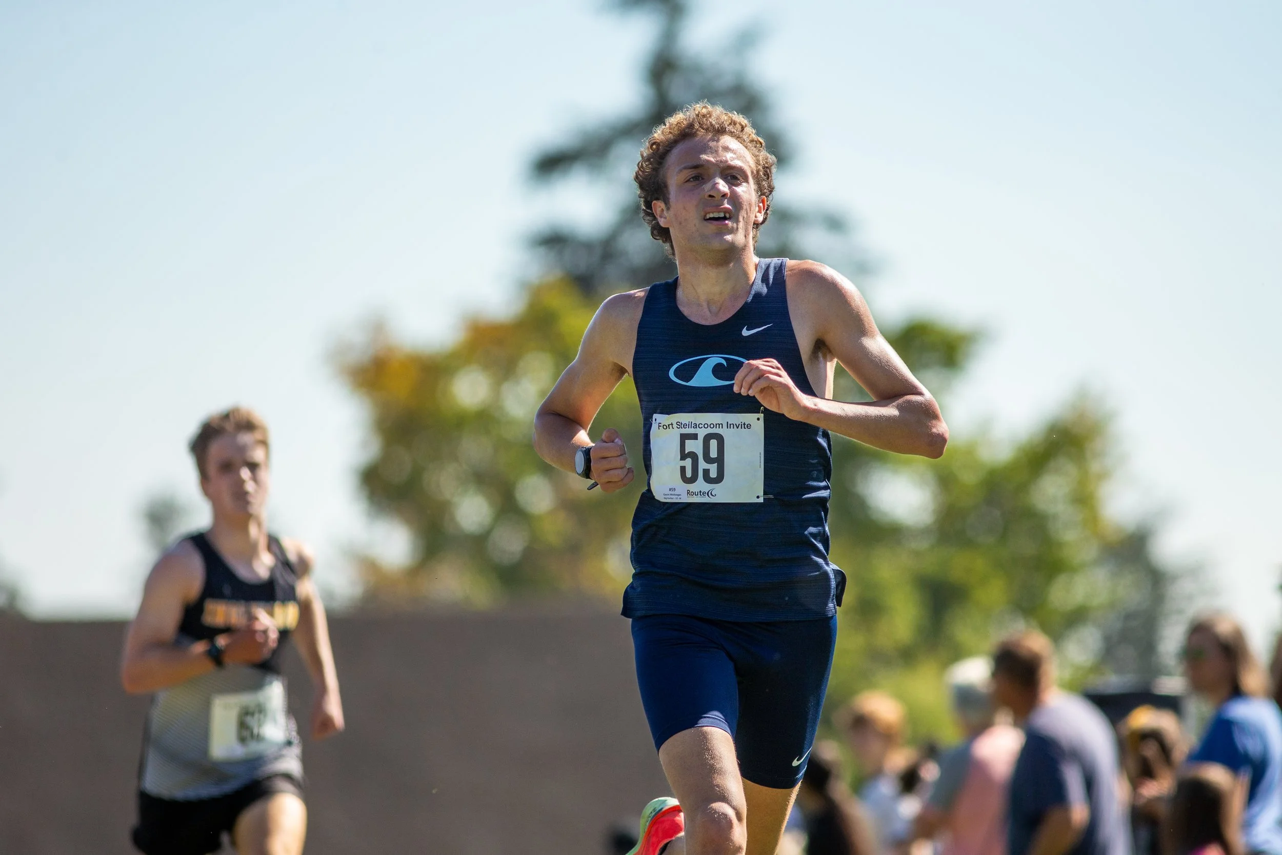 Gavin Mckeegan (Gig Harbor), finished in 10th place with a time of 16:06.4