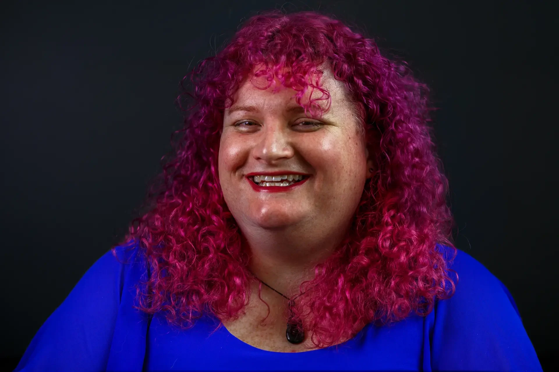 Hazel Bloom posing for a commercial portrait session in downtown Olympia, WA, by Russell Moore Photography.